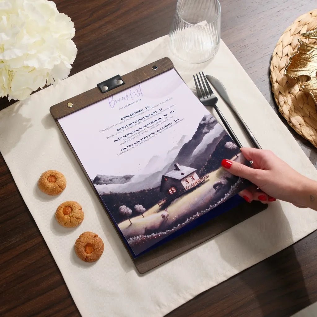 Personalized wood menu sleeve with fine logo etching.