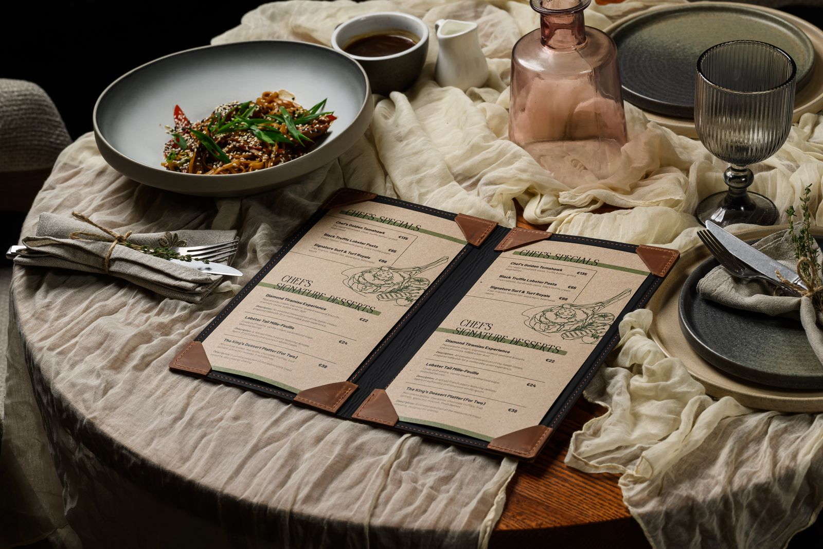 Open leather menu folder with corner mountings on a dining table