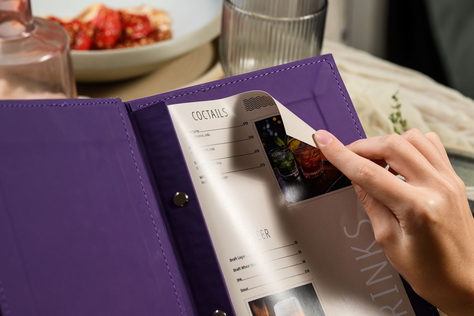Purple cocktail menu cover, open