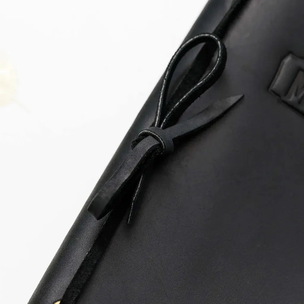 Custom menu books with embossed leather logos.