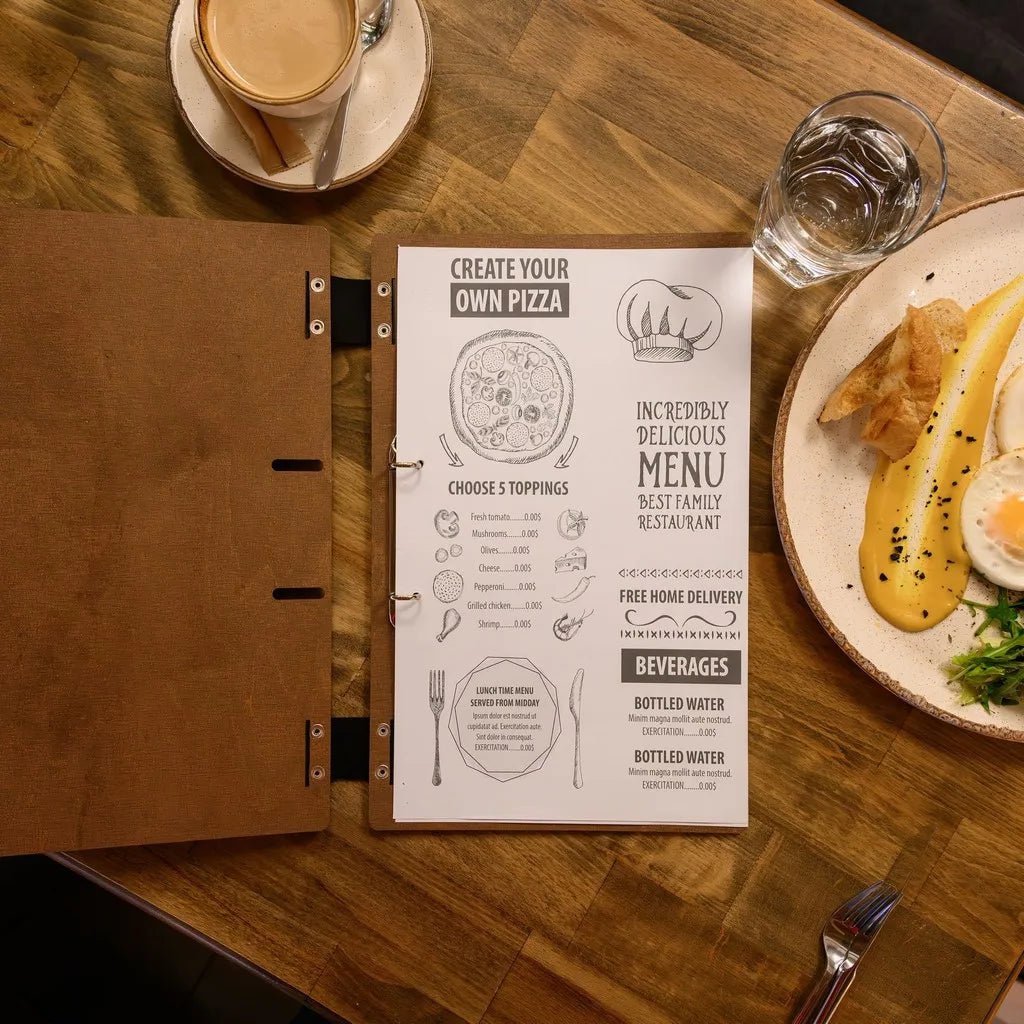 Handcrafted menu covers restaurant with premium materials.
