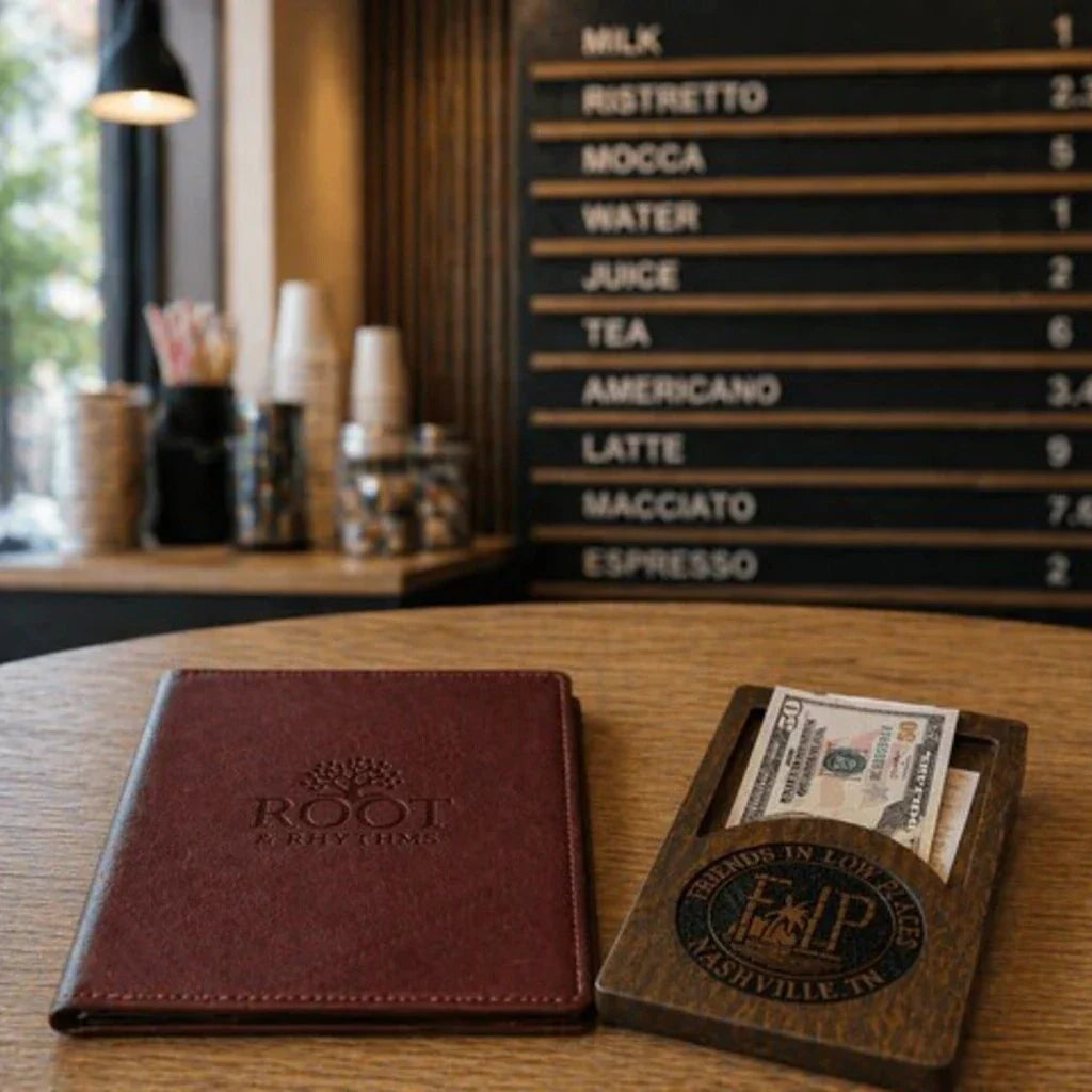 Budget pizzeria setup with oak wall menu board, leather menu covers, and wooden bill holder — real InkoHoreca client case