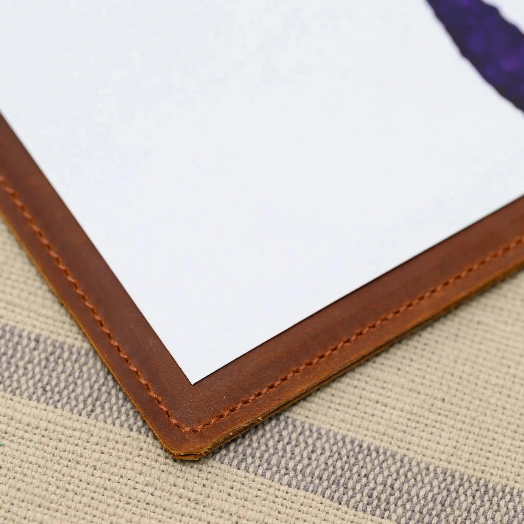 Add a touch of class to your menu display with our leather board featuring an elegant clip.