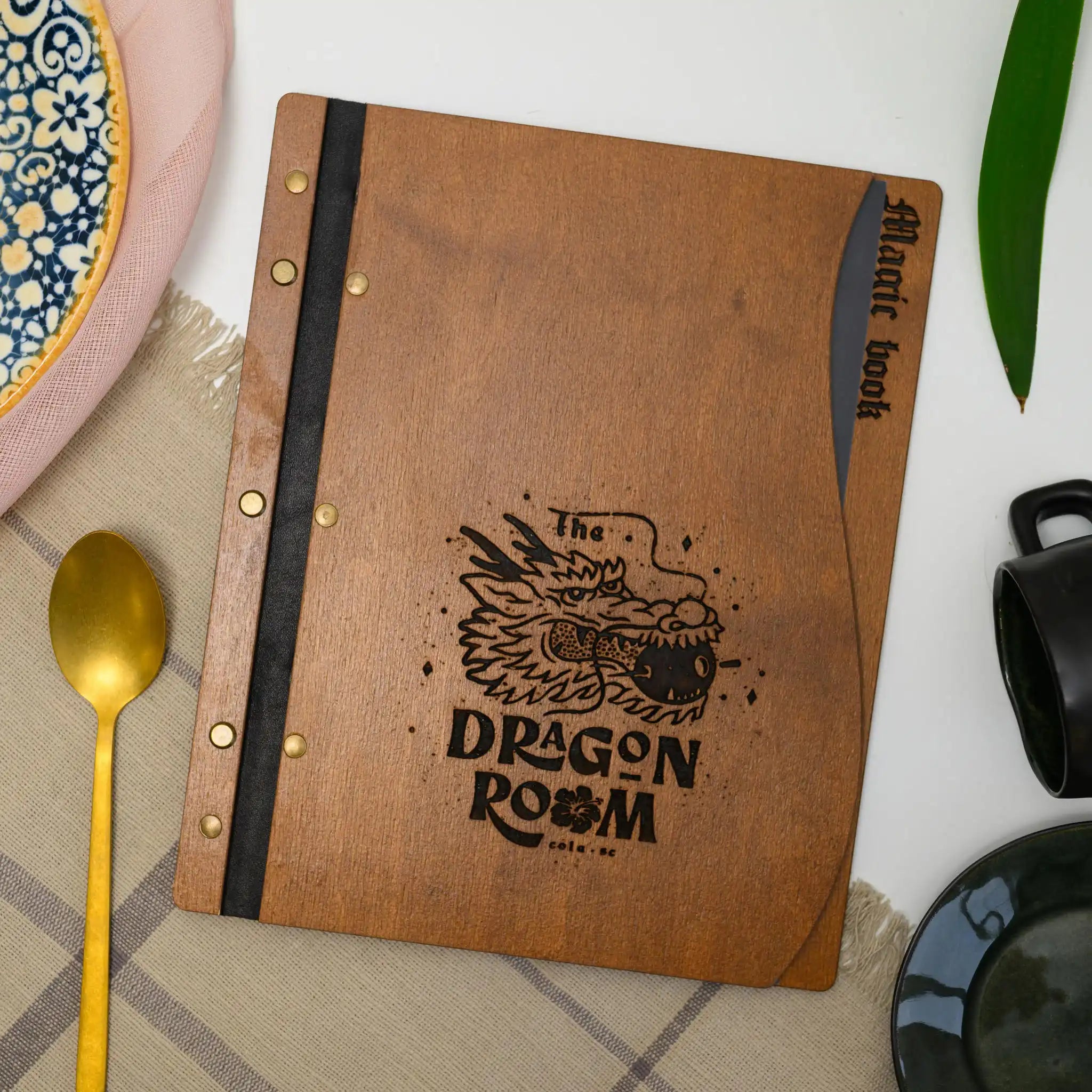 Artisanal Wooden Menu Folder: Adds rustic charm to your menu presentation.