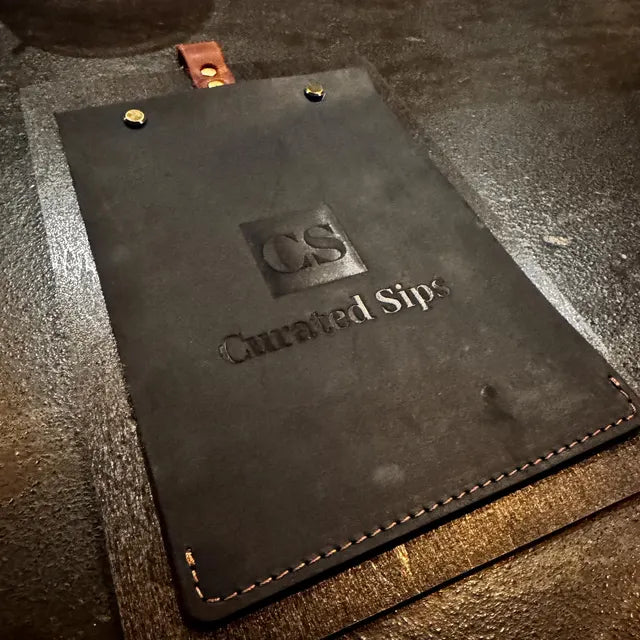 CS “Curated Sips” — Custom leather menu covers