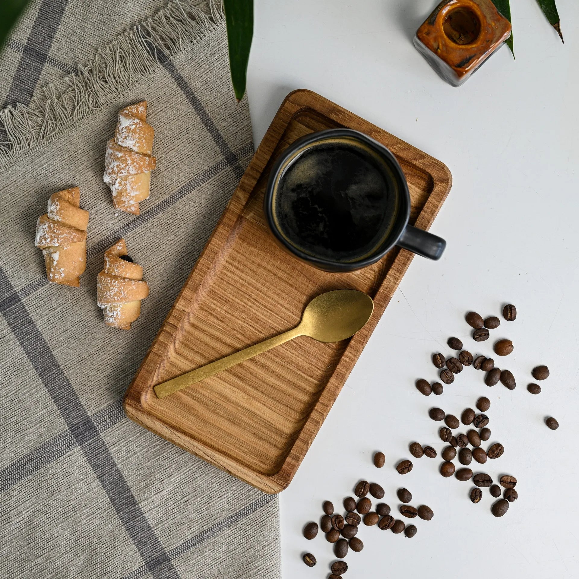 Personalized wooden serving tray, great for presenting meals and beverages in hotels with a rustic touch.