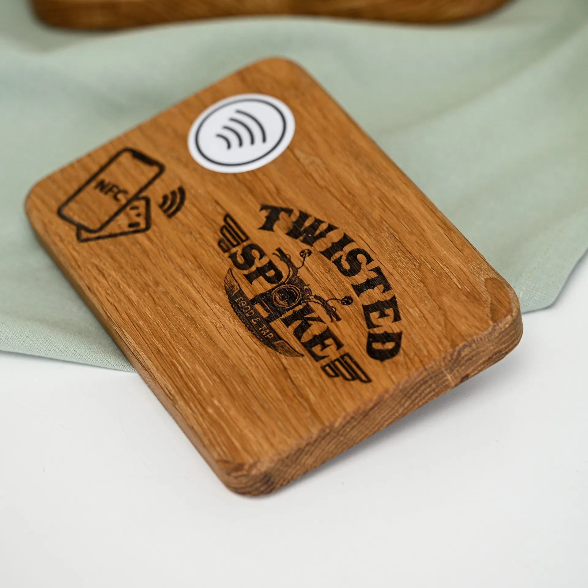 Personalized NFC tag stand with logo engraving, adding convenience and elegance to your payment process.