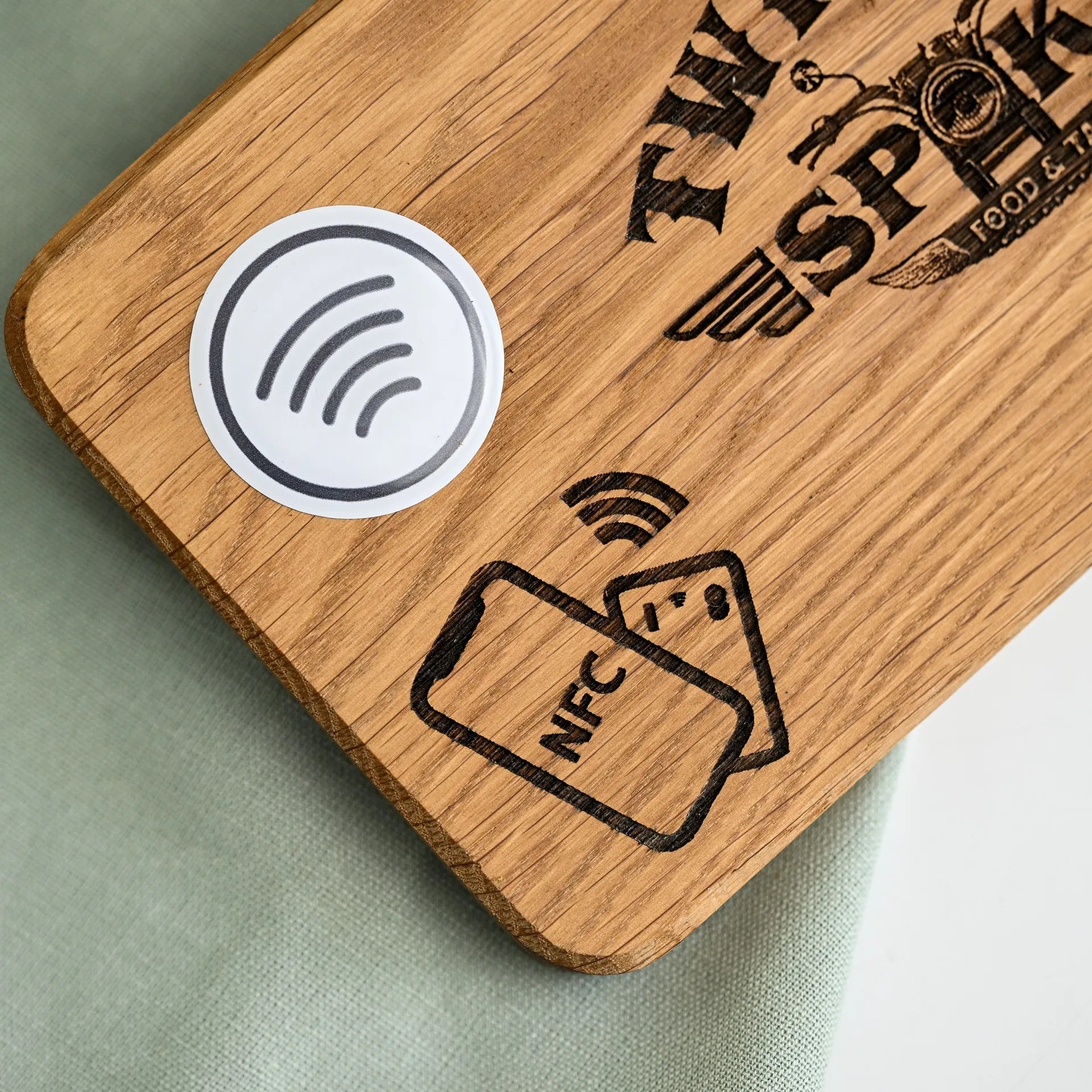NFC tag stand with personalized logo engraving, perfect for modernizing your restaurant's payment system