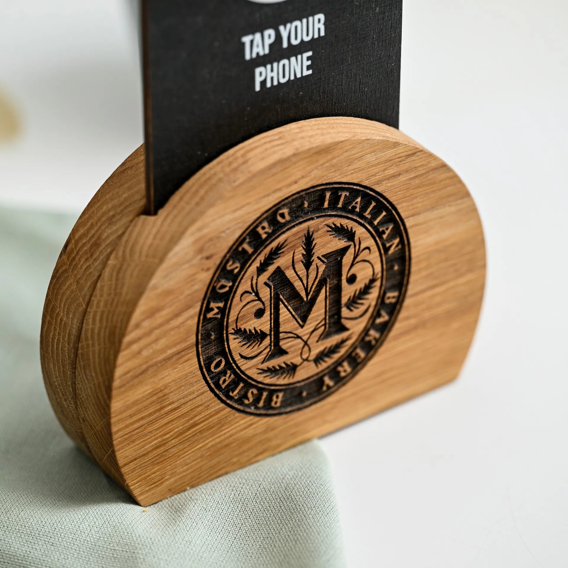 Immerse diners in a seamless dining experience with our NFC tag and QR code sign, elegantly showcased on a wooden stand for easy interaction.