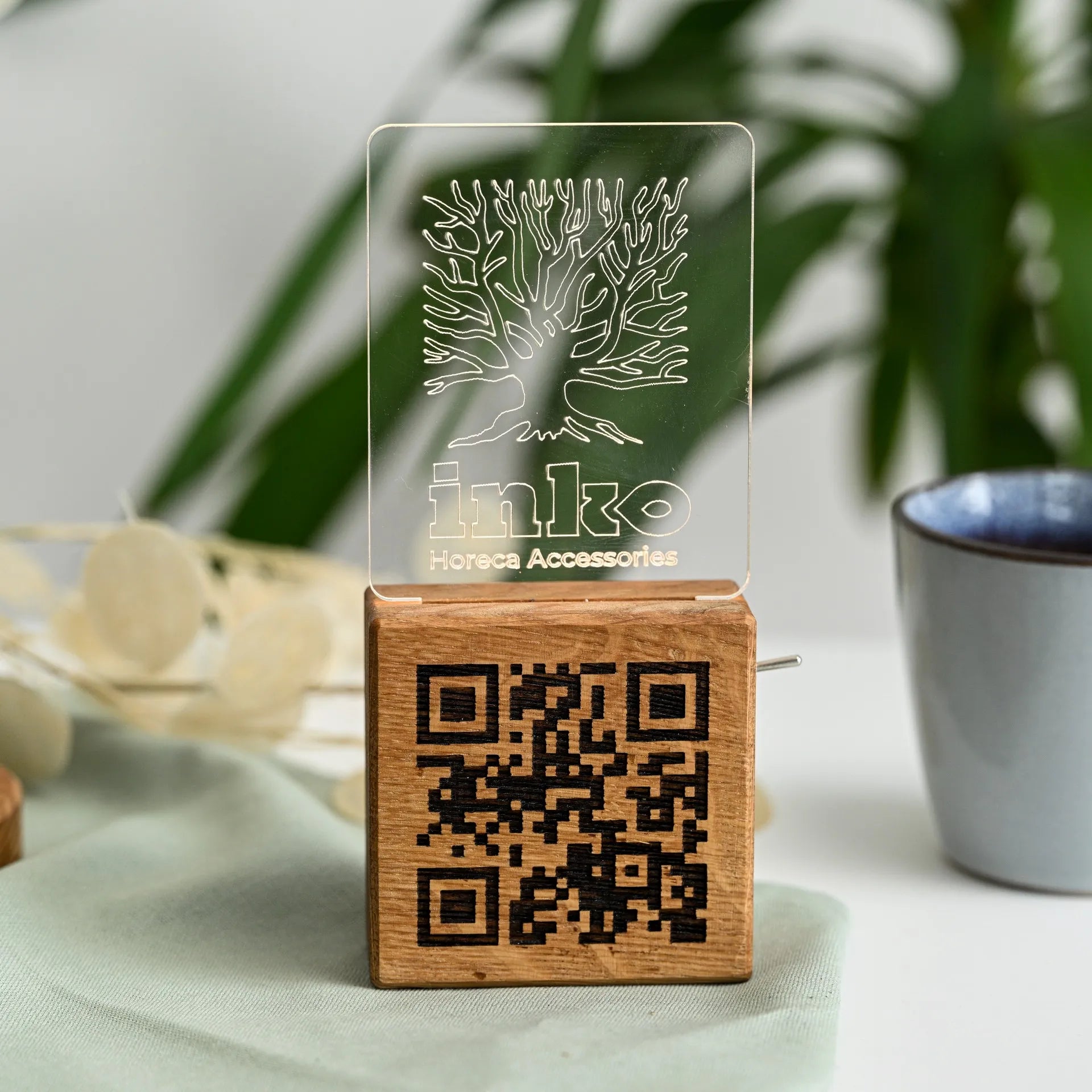 Elevate your restaurant with a wooden stand for QR codes.