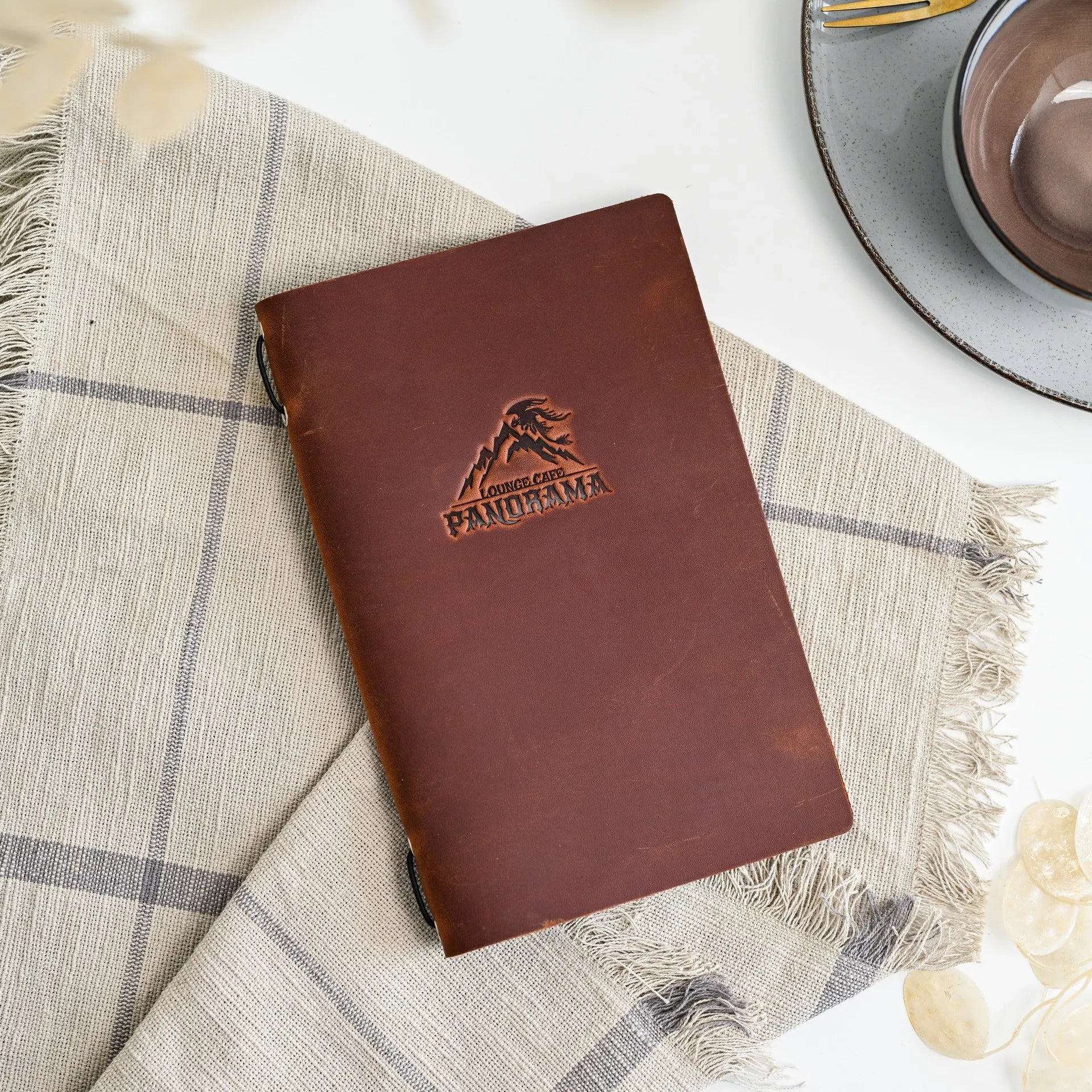 Make a statement with our customizable leather menu cover, tailored to reflect your restaurant’s unique style.