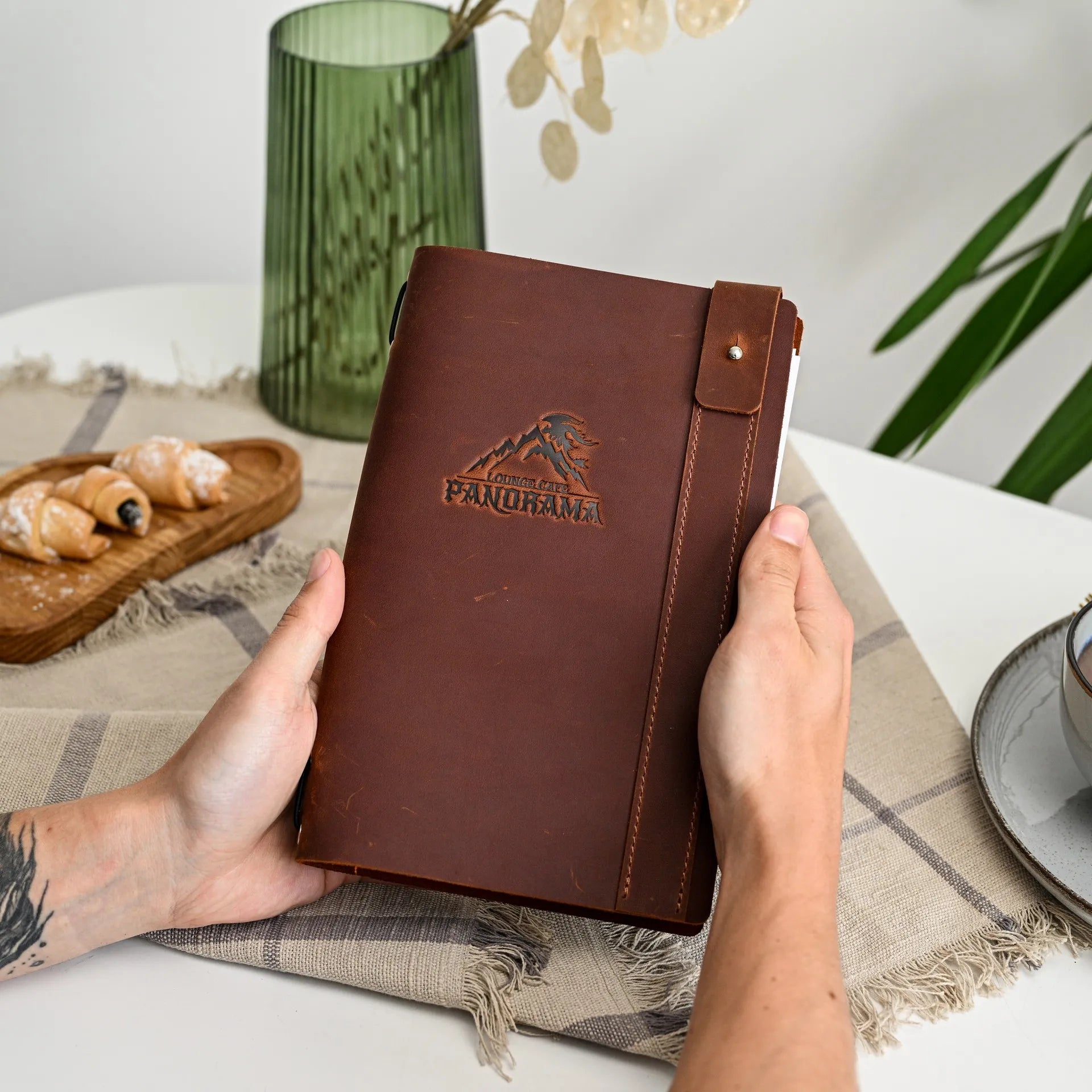 Showcase your brand with custom embossing on our leather menu holder, perfect for a unique dining experience.
