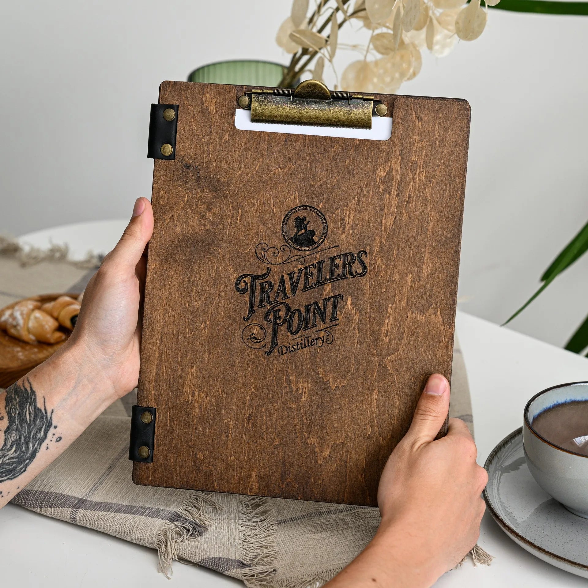  Elevate your presentation with our engraved wooden menu holder, adding rustic charm to your restaurant.