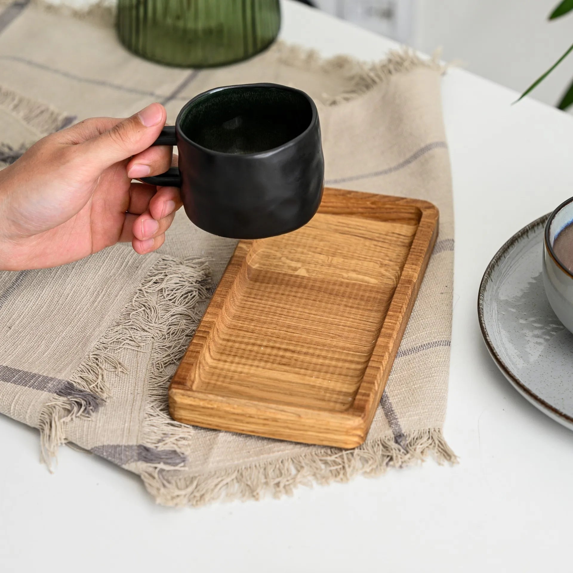 This custom wooden serving tray is ideal for restaurant kitchens, offering a blend of functionality and rustic appeal.