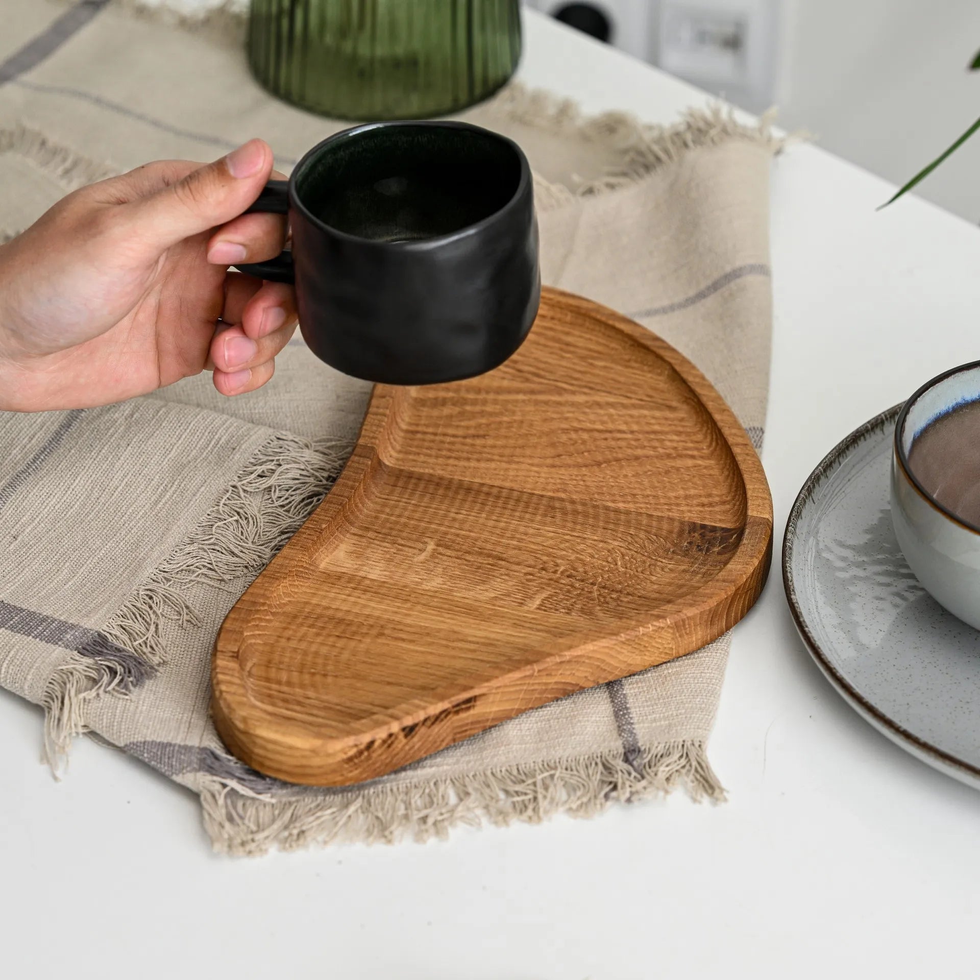 Rustic wooden tray, designed for hotel service, adding a charming and elegant presentation to room service meals and beverages.