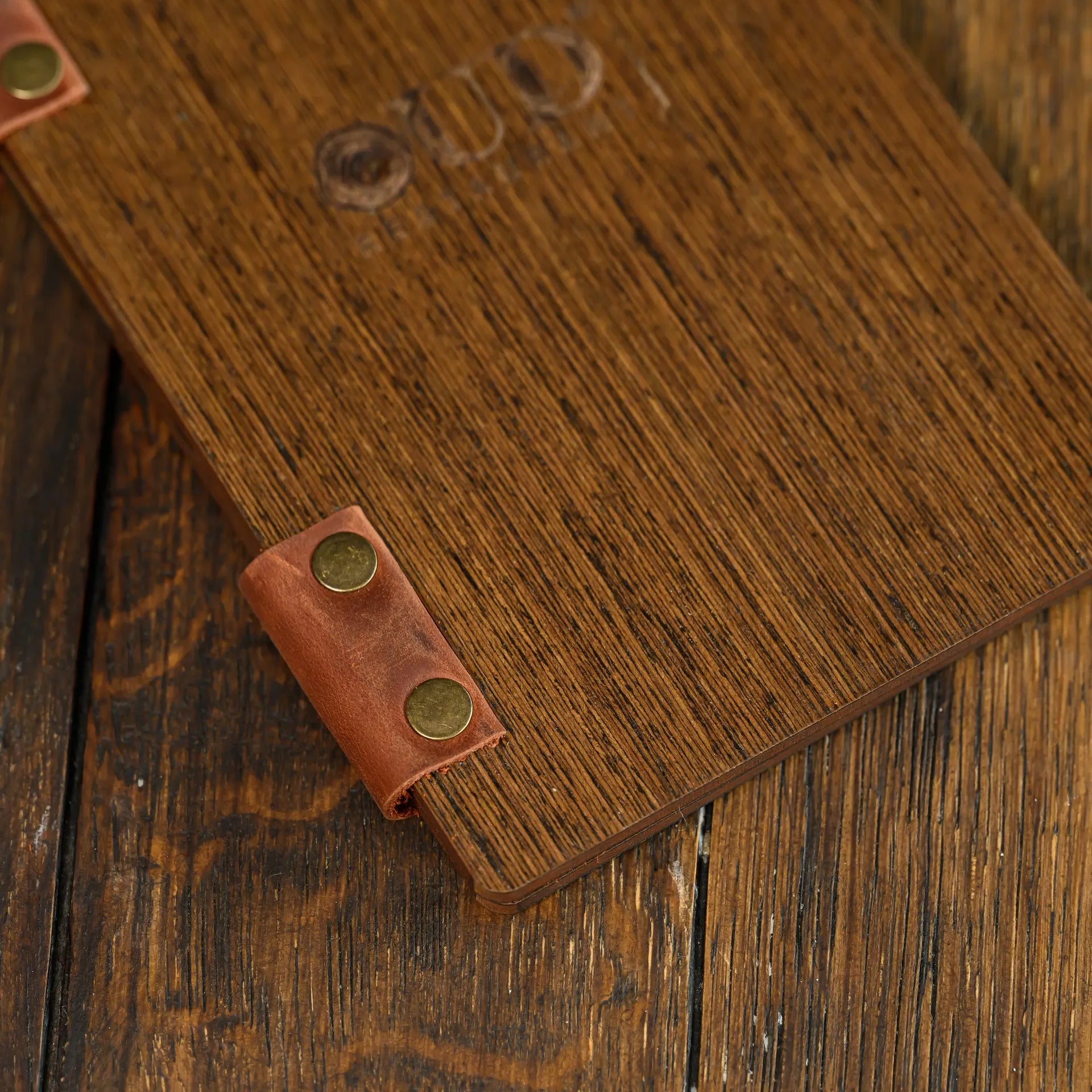 Customized Check Holder made from veneered HDF. Durable and stylish, featuring logo engraving for restaurant meal invoices