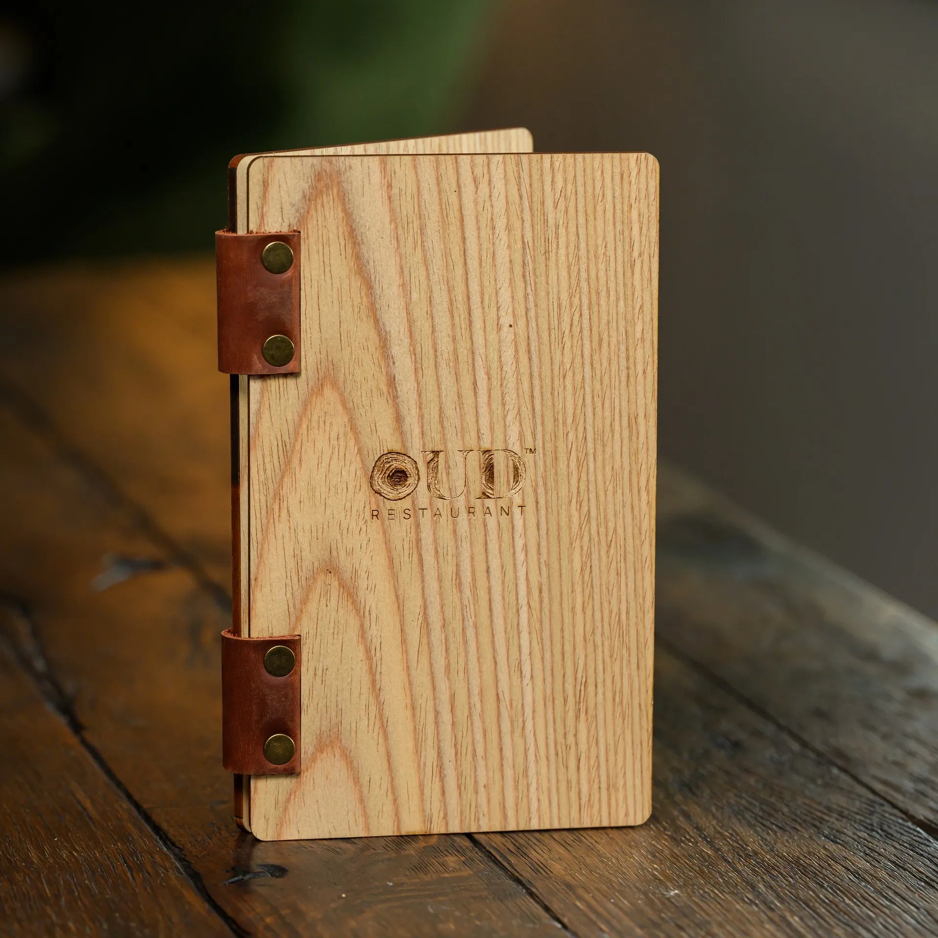 Elegant Veneered HDF Bill Presenter for restaurants. Features logo engraving and a durable build for professional meal invoice presentation.