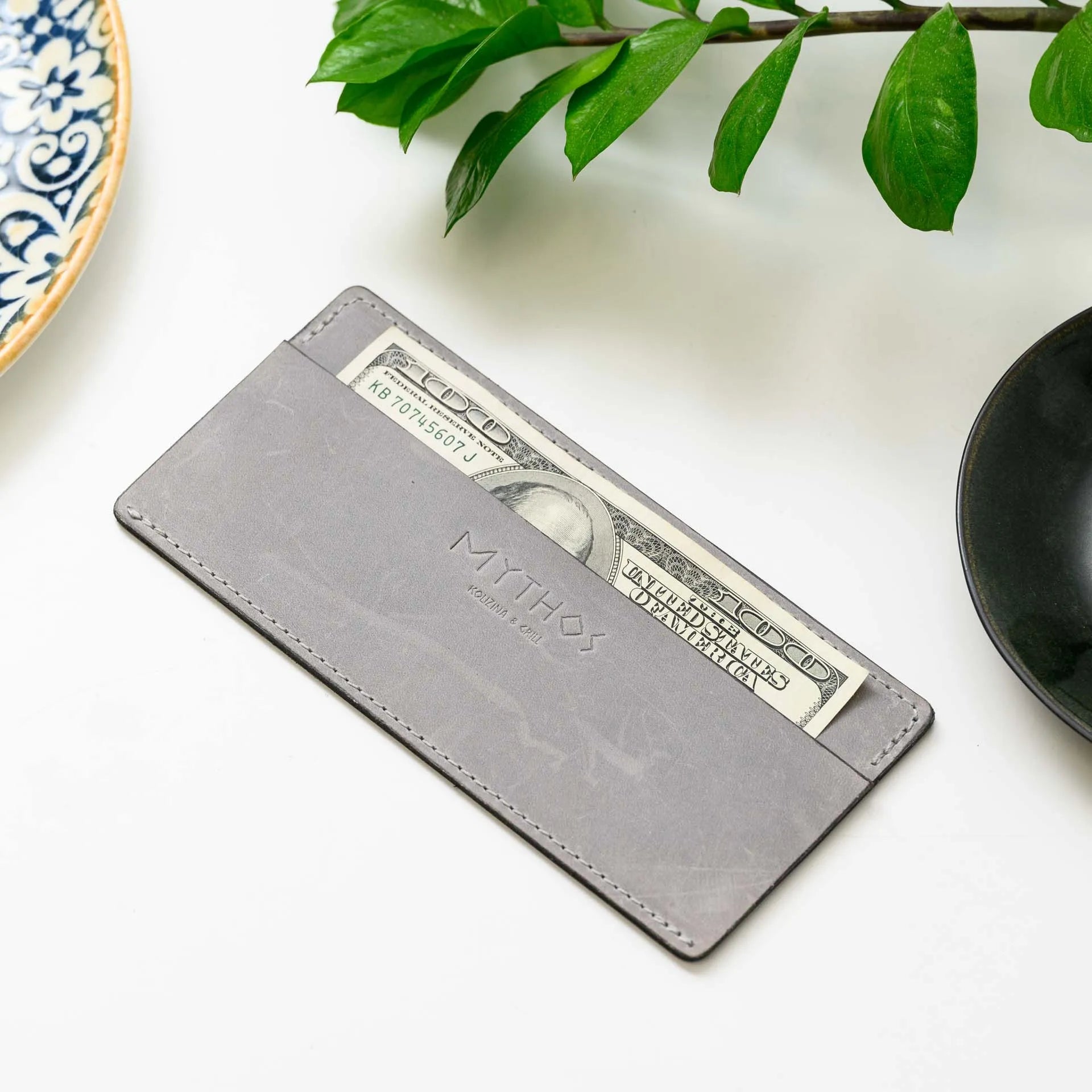 Custom Embossed Leather Holder: Offer guests a premium experience with a custom-embossed leather bill holder.