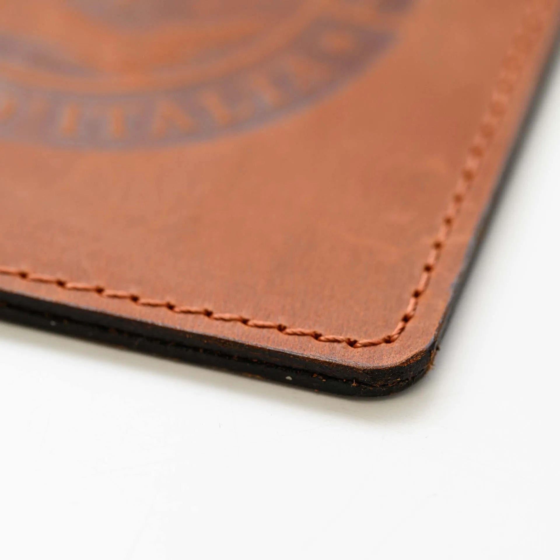 Sophisticated Leather Check Holder: Combine functionality and elegance with a custom logo-embossed bill presenter.