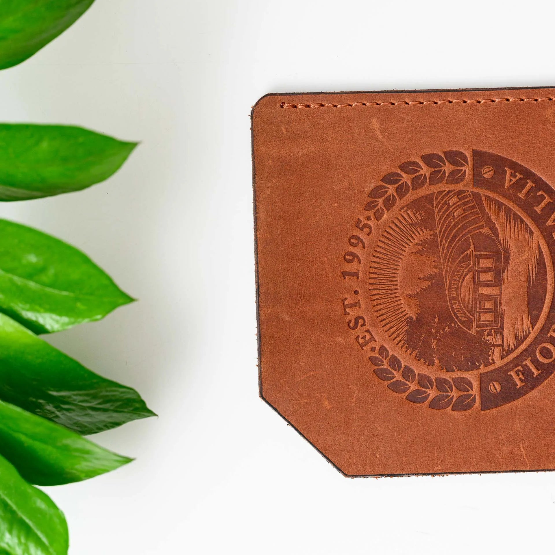 Custom Leather Bill Presenter: Impress patrons with a high-quality leather bill holder embossed with your logo.