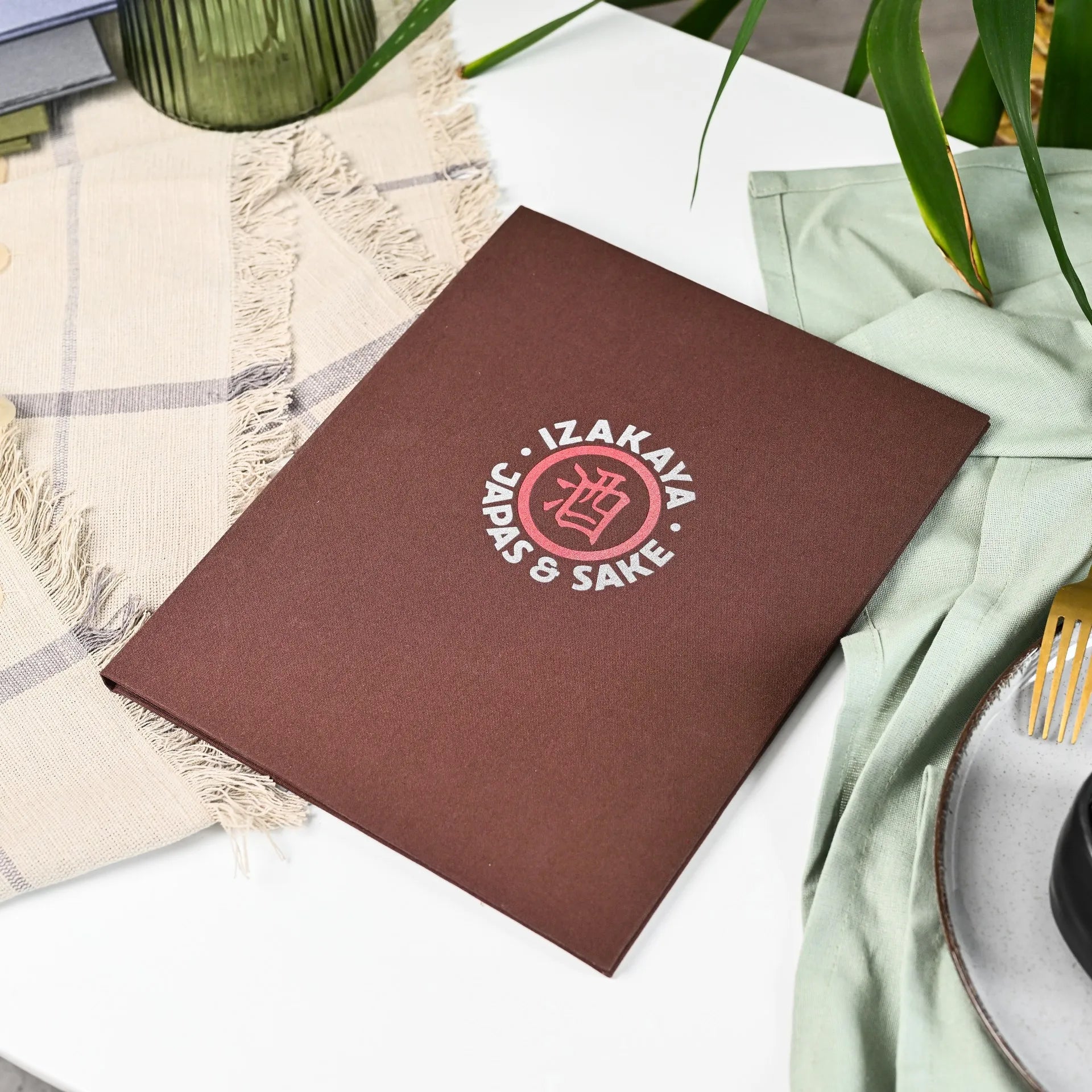 Customizable fabric menu cover with logo, perfect for restaurants. Durable design with changeable sheets for effortlessly updating drink and wine lists.