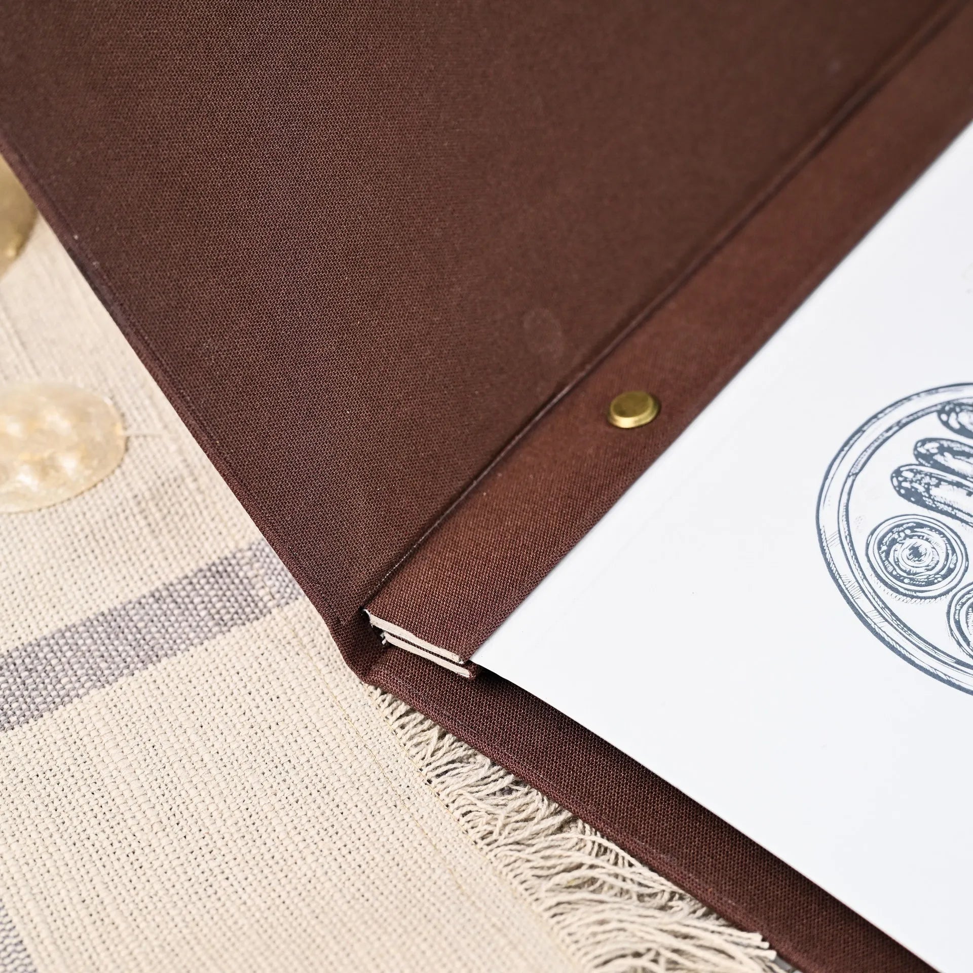 Custom fabric menu folder with logo printing, designed for restaurant use. Changeable sheets make it easy to keep your drink and wine list fresh.