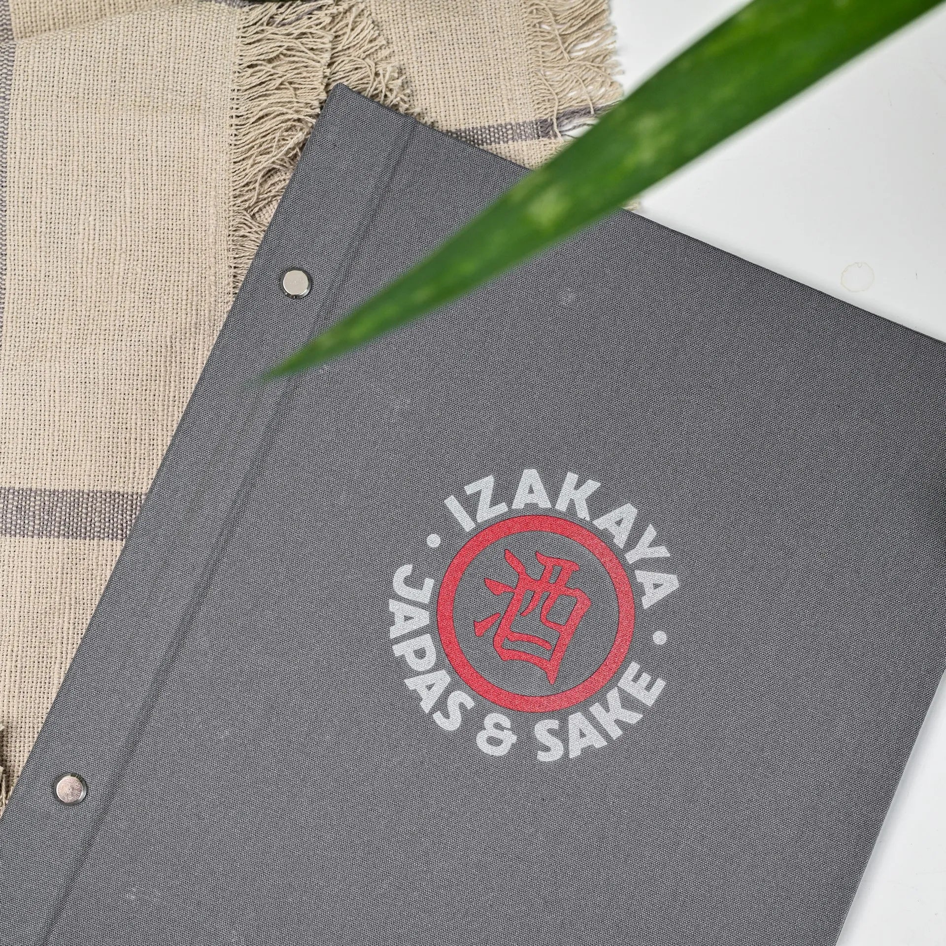 Elegant drink menu cover with personalized logo, perfect for restaurants. Easily changeable sheets allow for quick updates to your menu offerings.