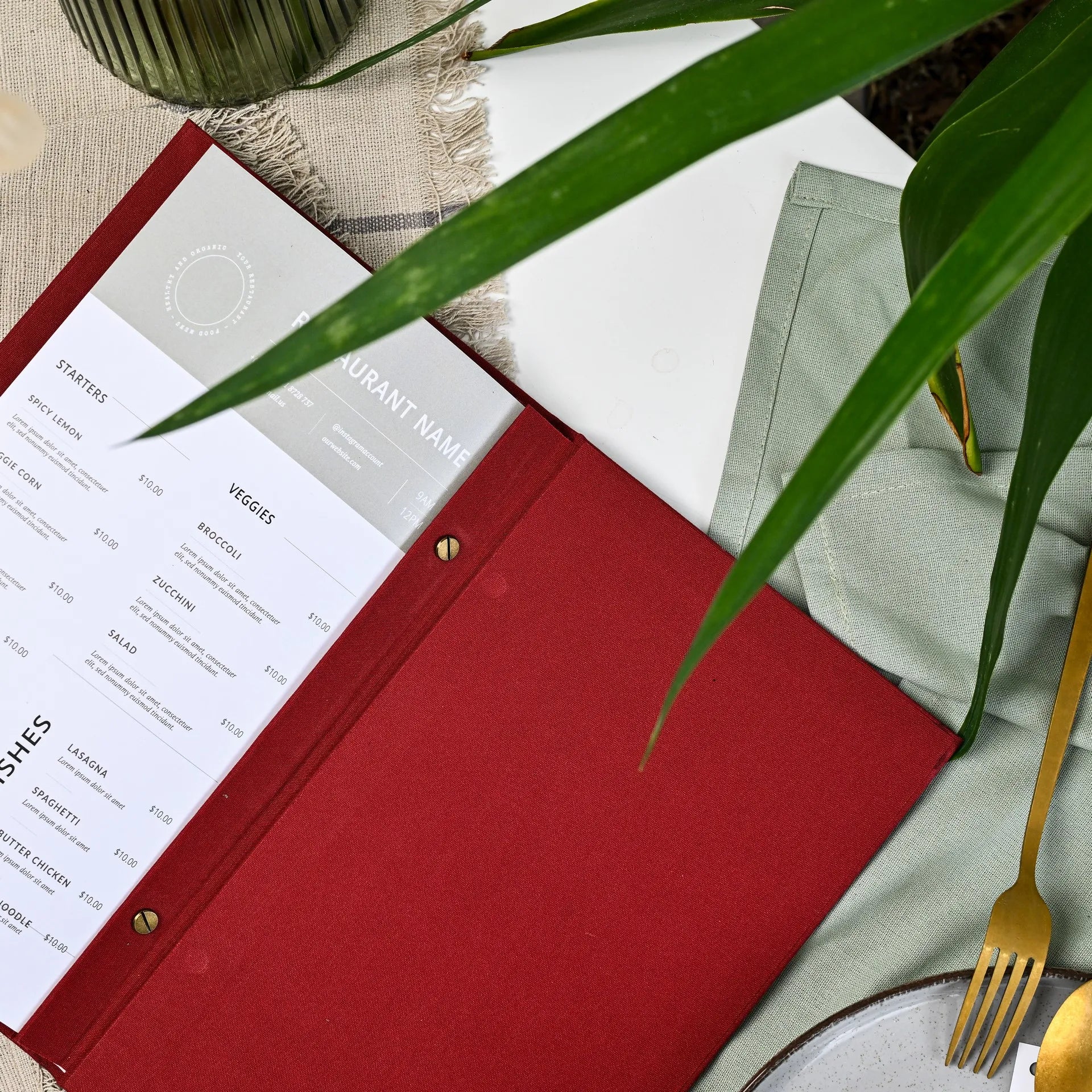 Personalized fabric menu book with logo printing, designed for restaurants. Changeable sheets allow for quick and easy updates to your drink menu.