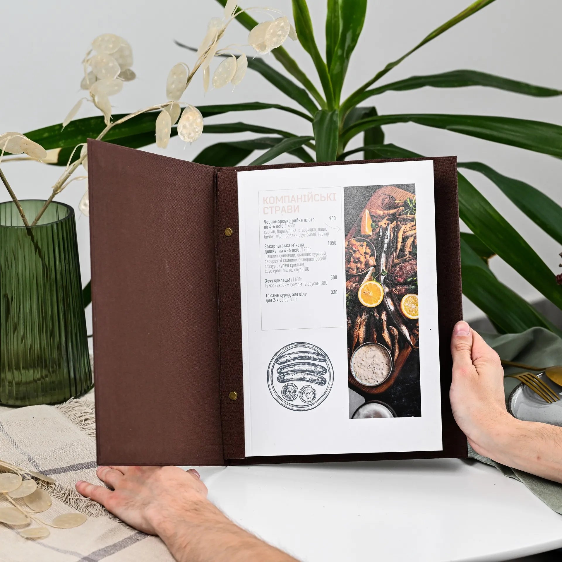 High-quality fabric menu folder with custom logo, designed for restaurant wine menus. Easily changeable sheets provide flexibility and ease of use.