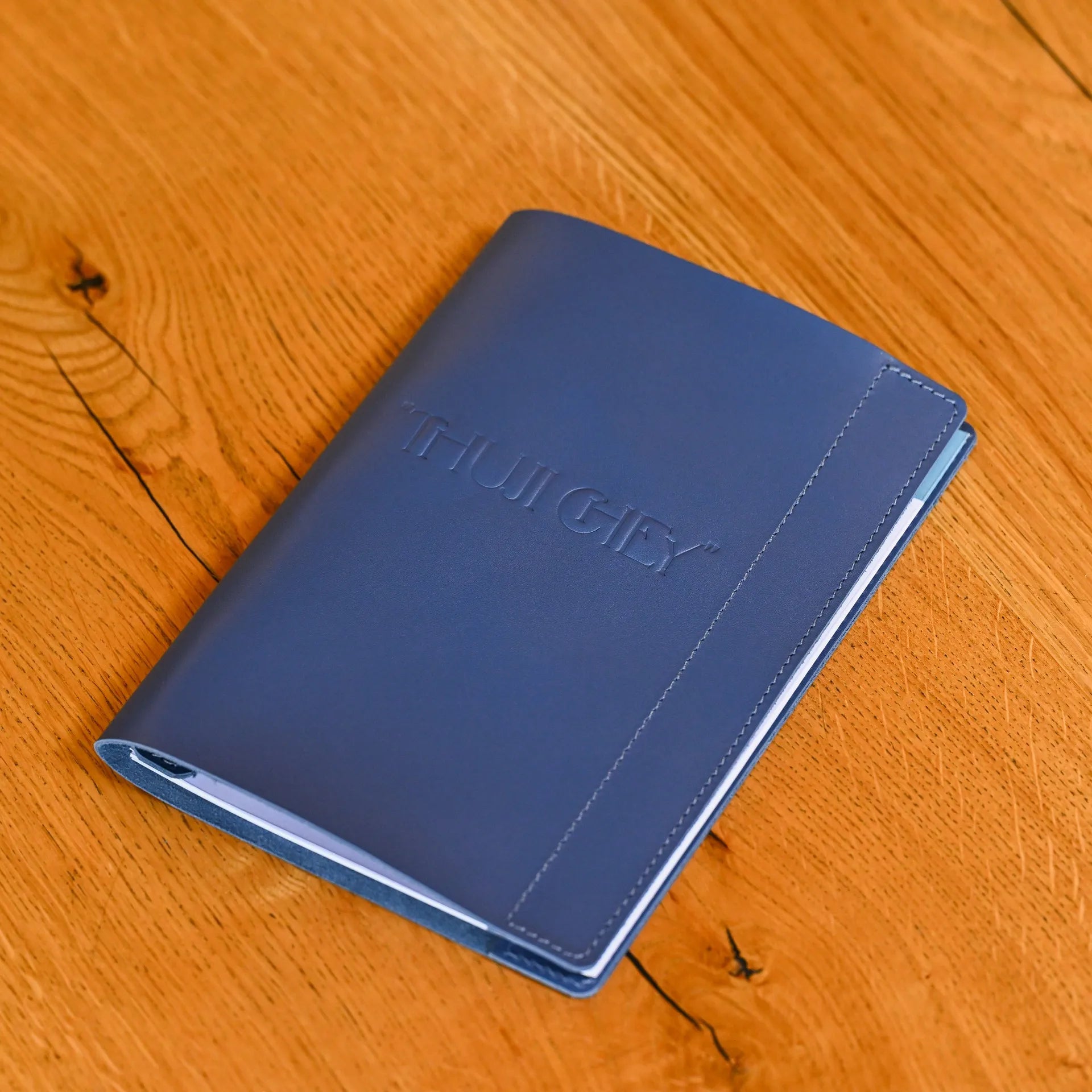 Leather menu folio with fixing plank for A5 sheets. Customizable design ideal for restaurant menus, adding a touch of luxury to any dining experience.