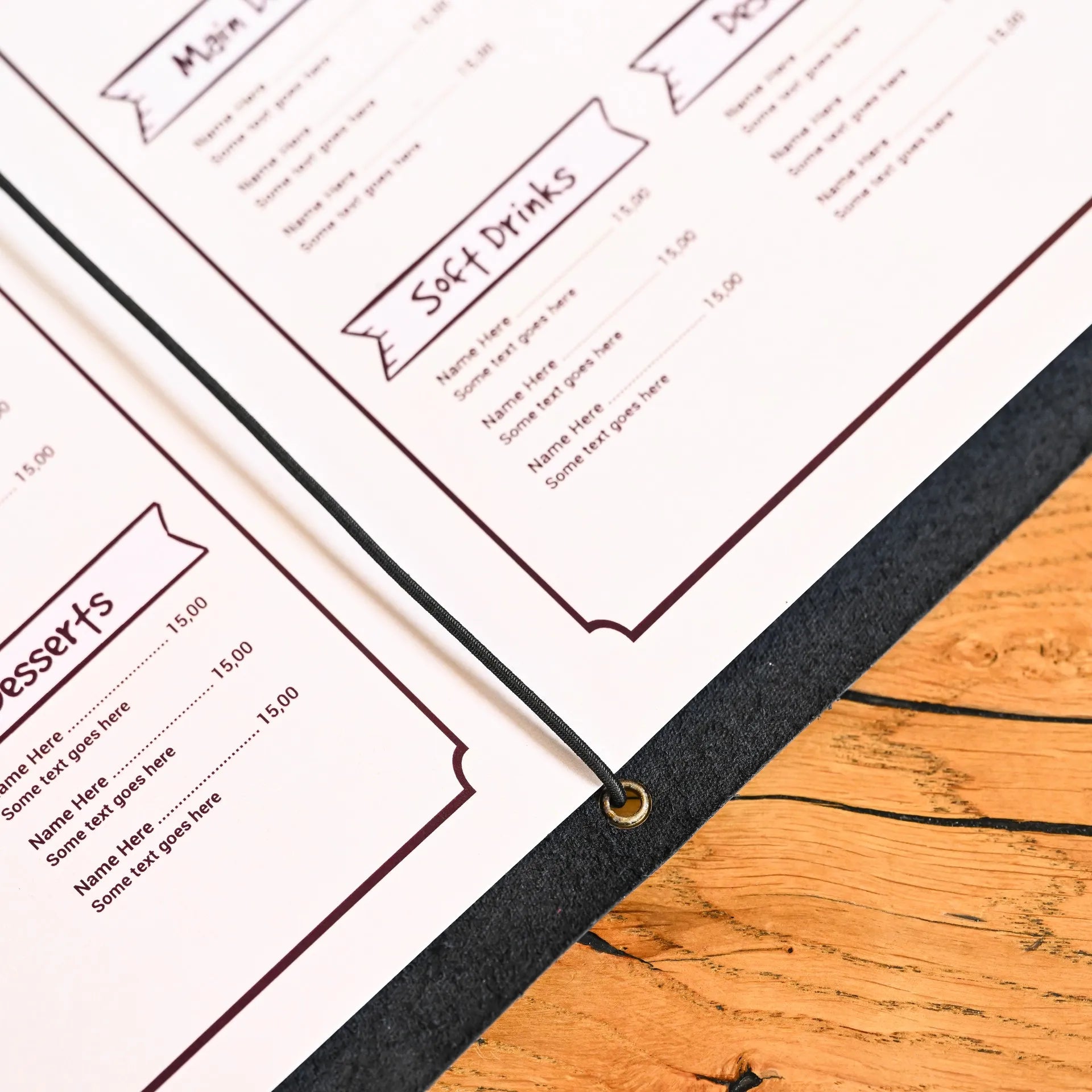 High-quality leather menu folder with an elastic strap, perfect for easily swapping drink or food menus. Personalize with your cafe or bar logo.