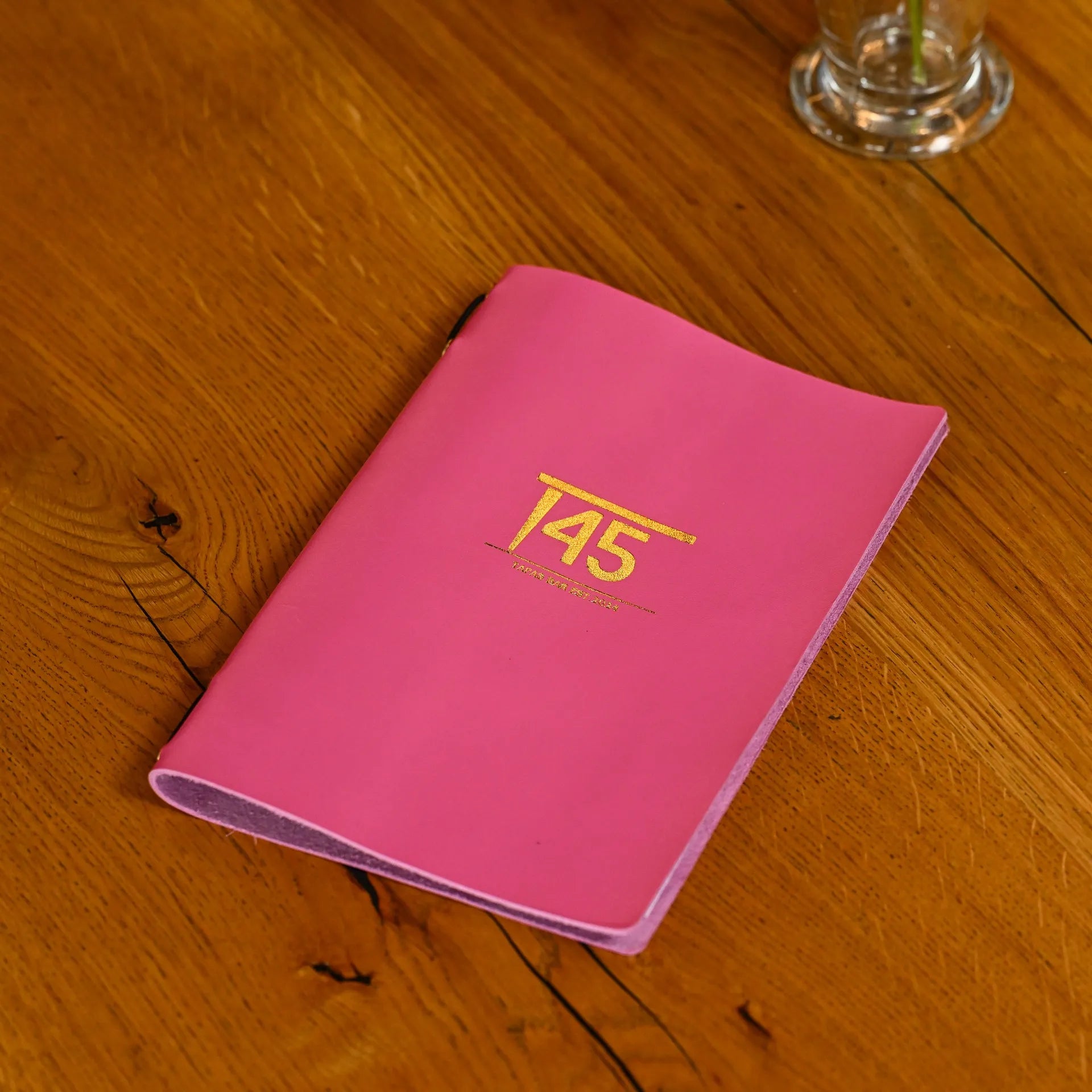 Elegant leather menu holder with custom logo embossing. Adds a personalized touch while showcasing menus in a sophisticated and durable design.