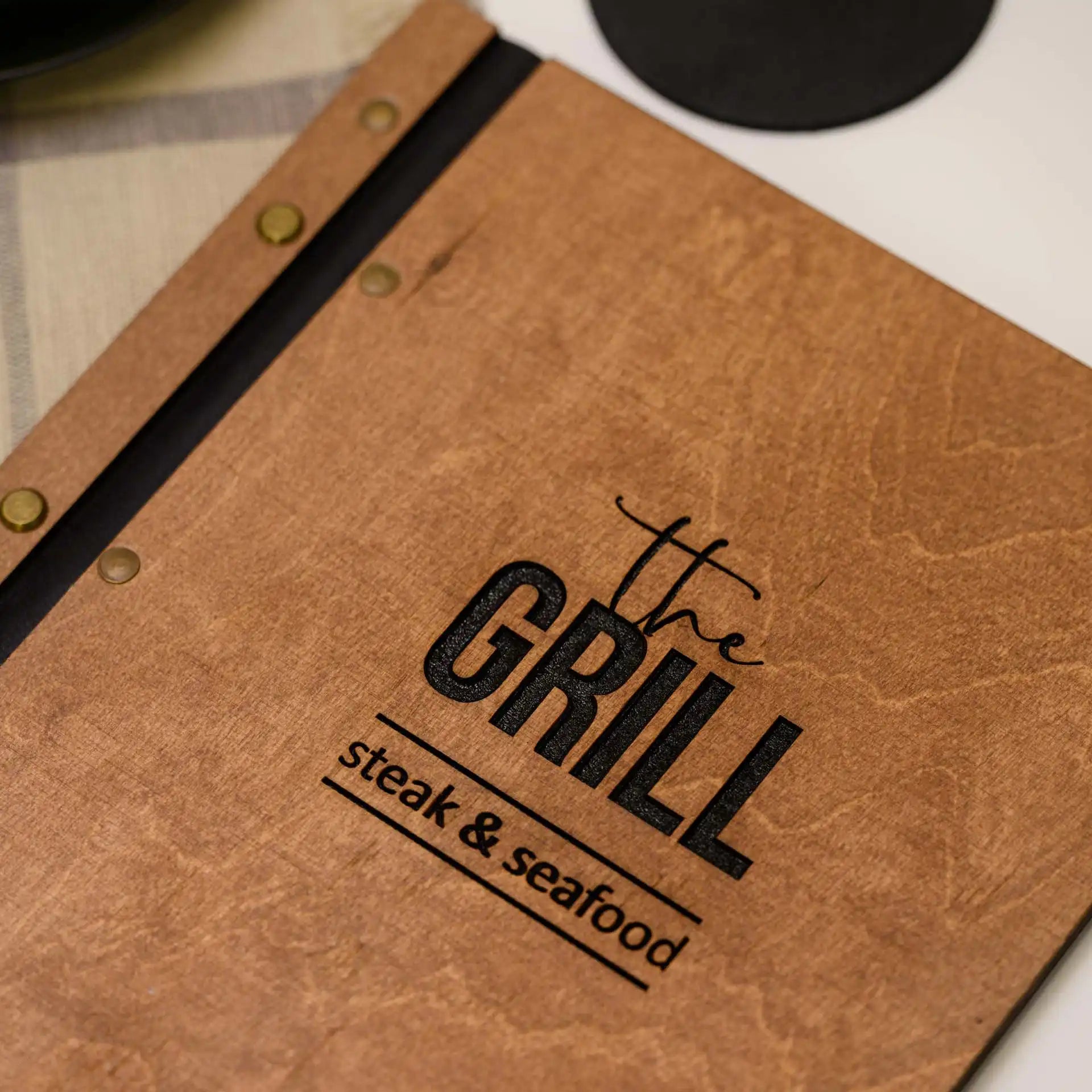 Chic Menu Book Cover: Enhance your menu presentation with sleek and modern design.