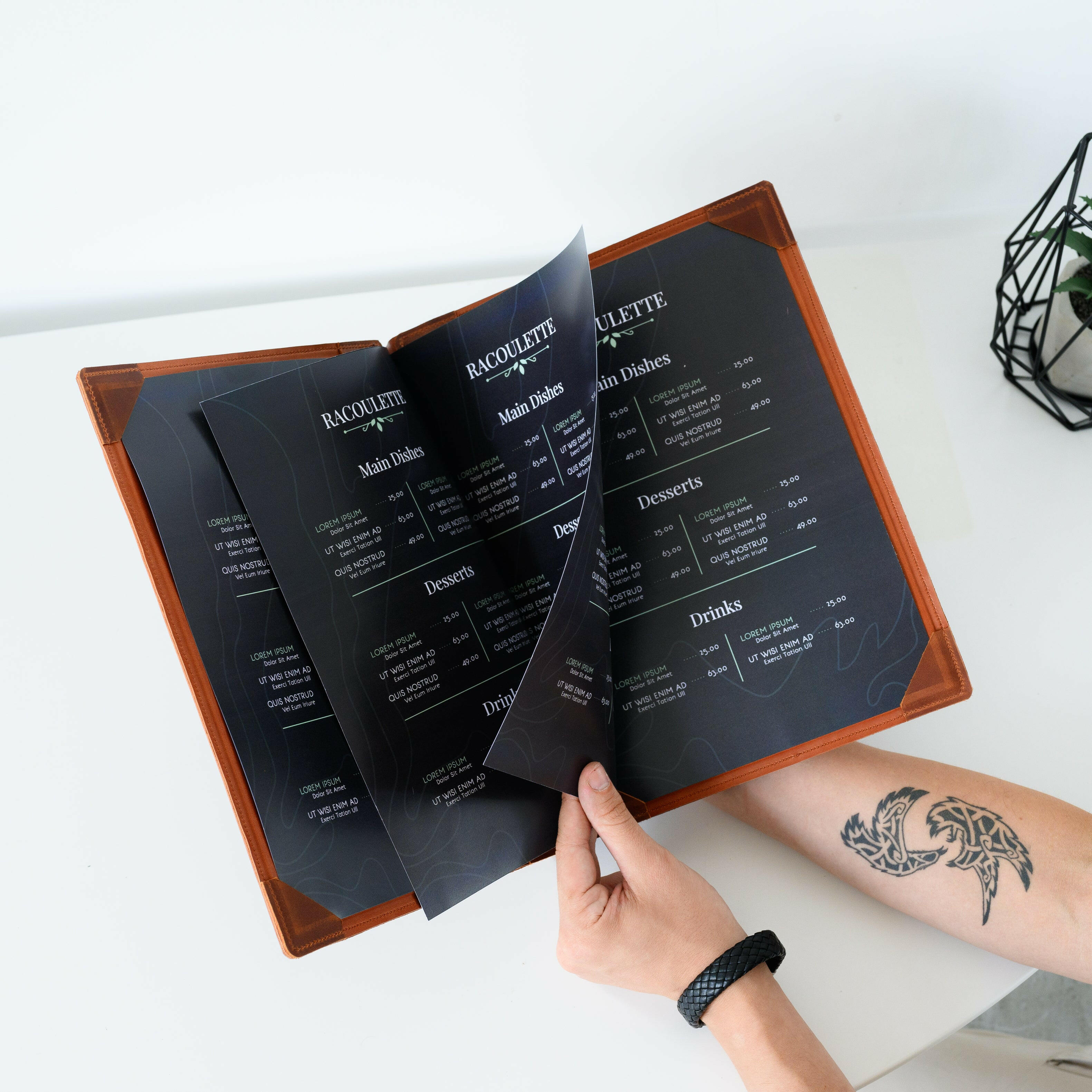 Present your menu with elegance using our hard cover holder with corner mounting, perfect for any fine dining establishment.