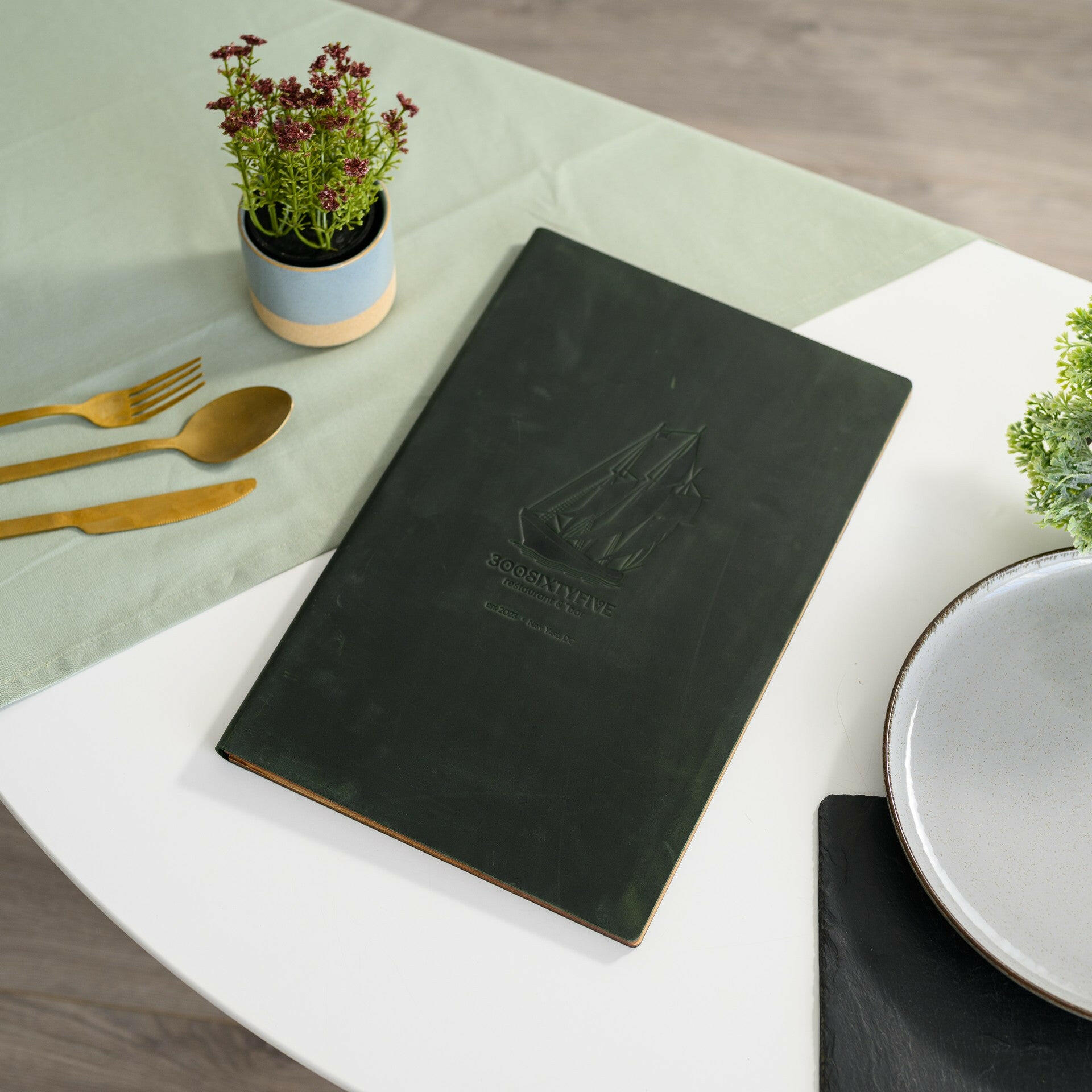 Sophisticated Style: Present your dinner menu on our elegant leather menu board, designed to fit legal-sized sheets perfectly.