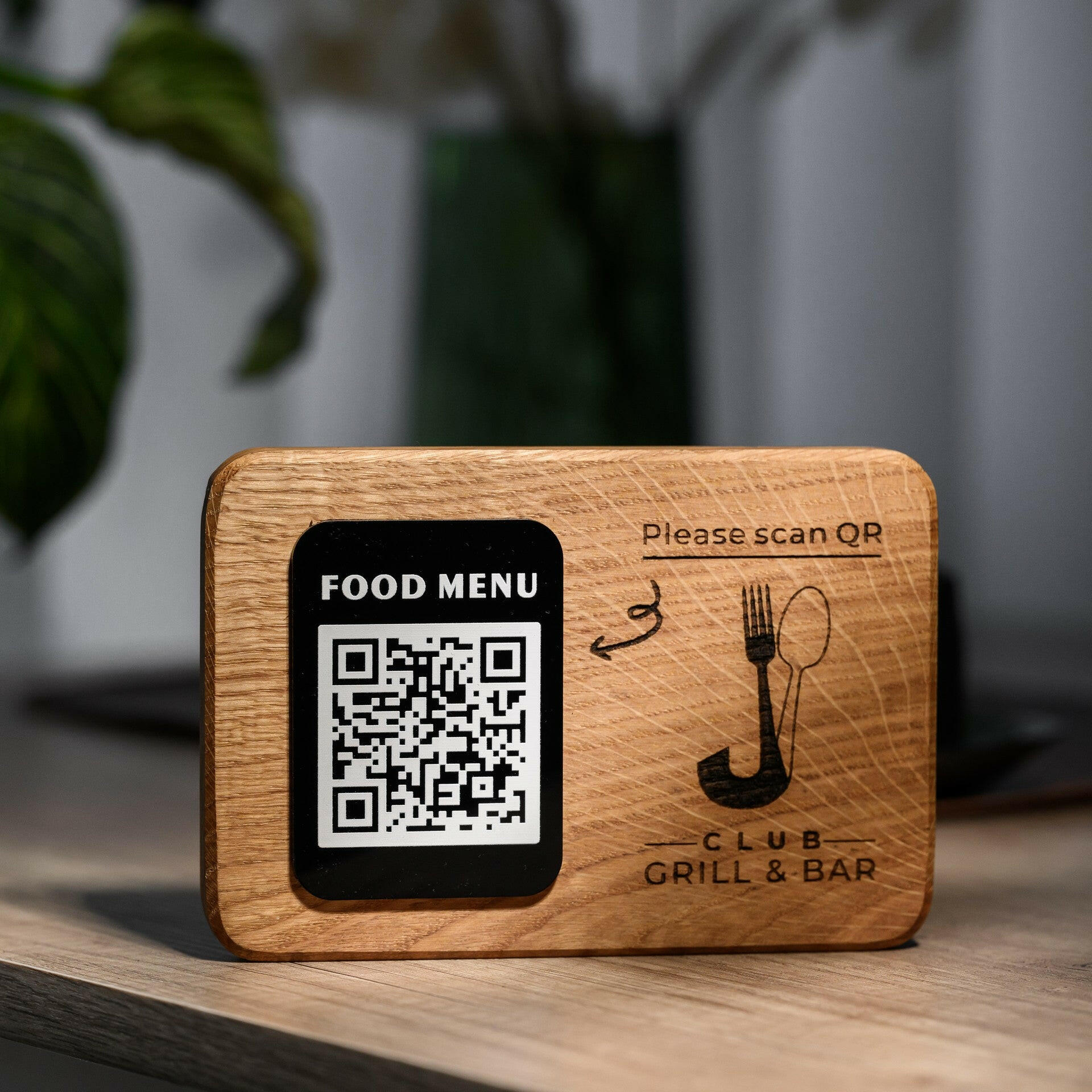 Elegant wooden plate with a touchless menu QR code, perfect for restaurants and cafes offering contactless service.