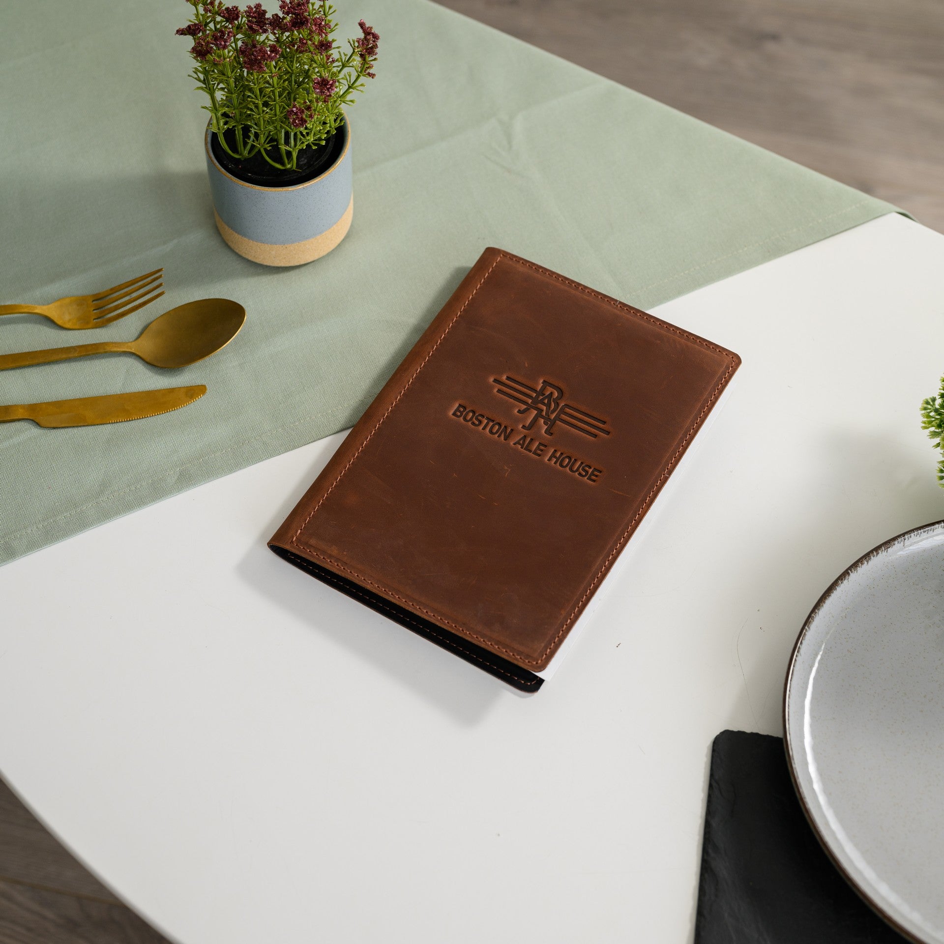 Impress patrons with our leather menu folder, complete with logo embossing for a personalized touch.