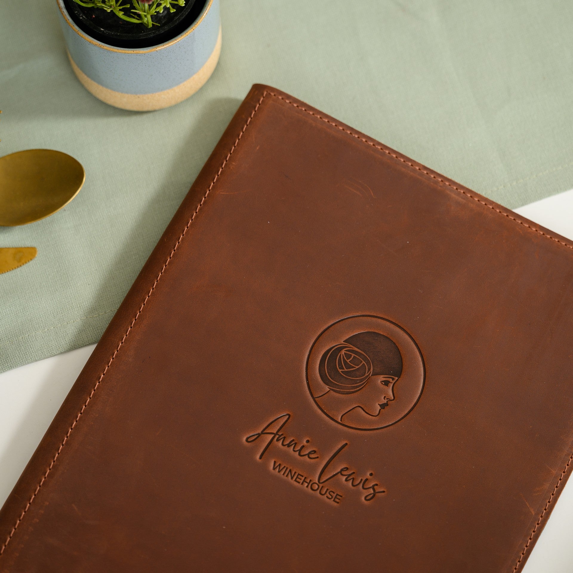 Our leather menu holder accommodates changeable sheets, ensuring your menu stays fresh and updated.
