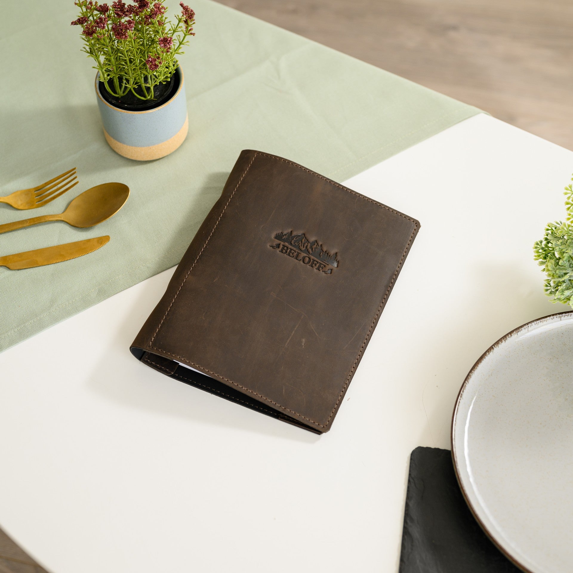 Discover the perfect blend of craftsmanship and style with our handcrafted menu, customized with logo embossing.