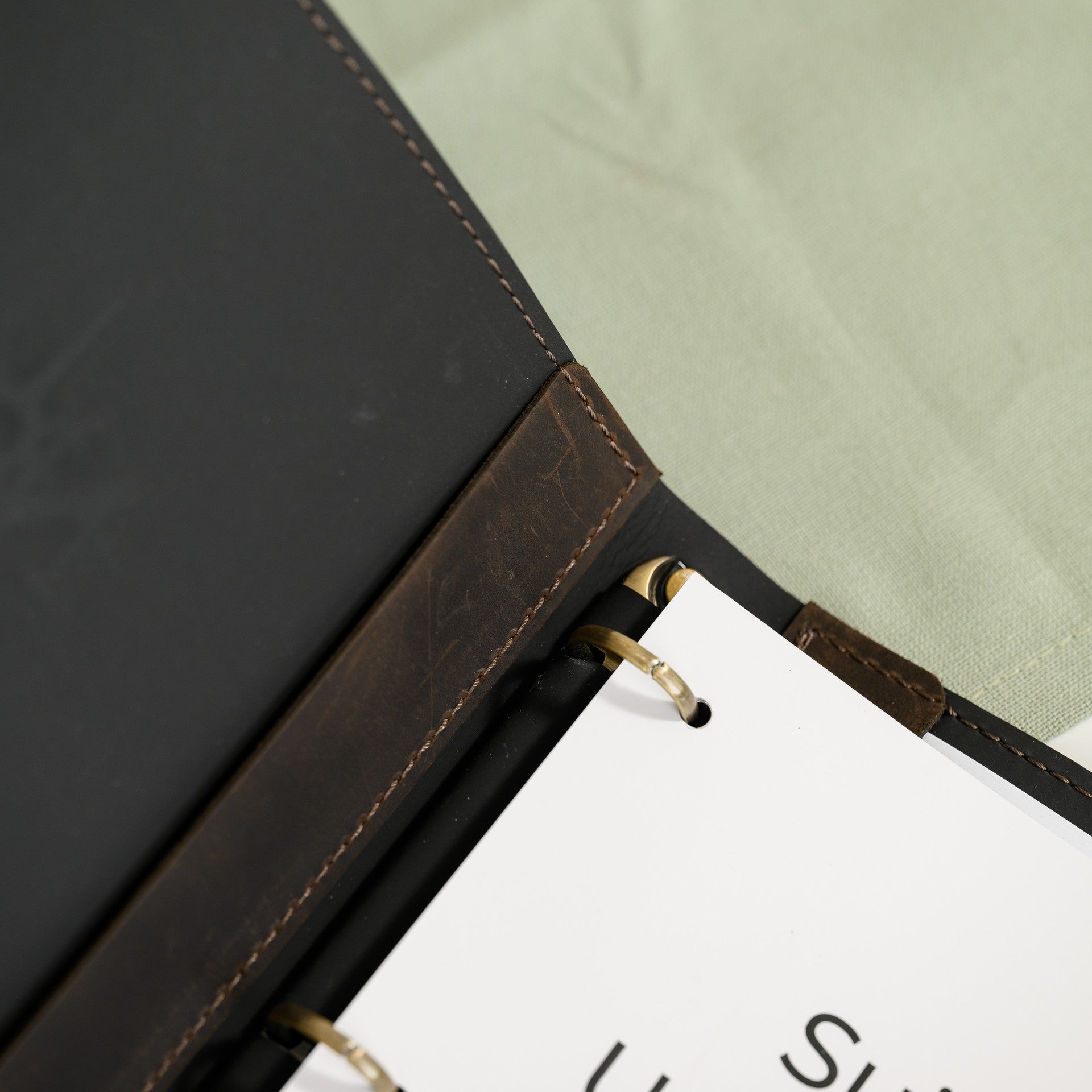Elevate your presentation with our handcrafted leather clipboard, perfect for a sophisticated touch.