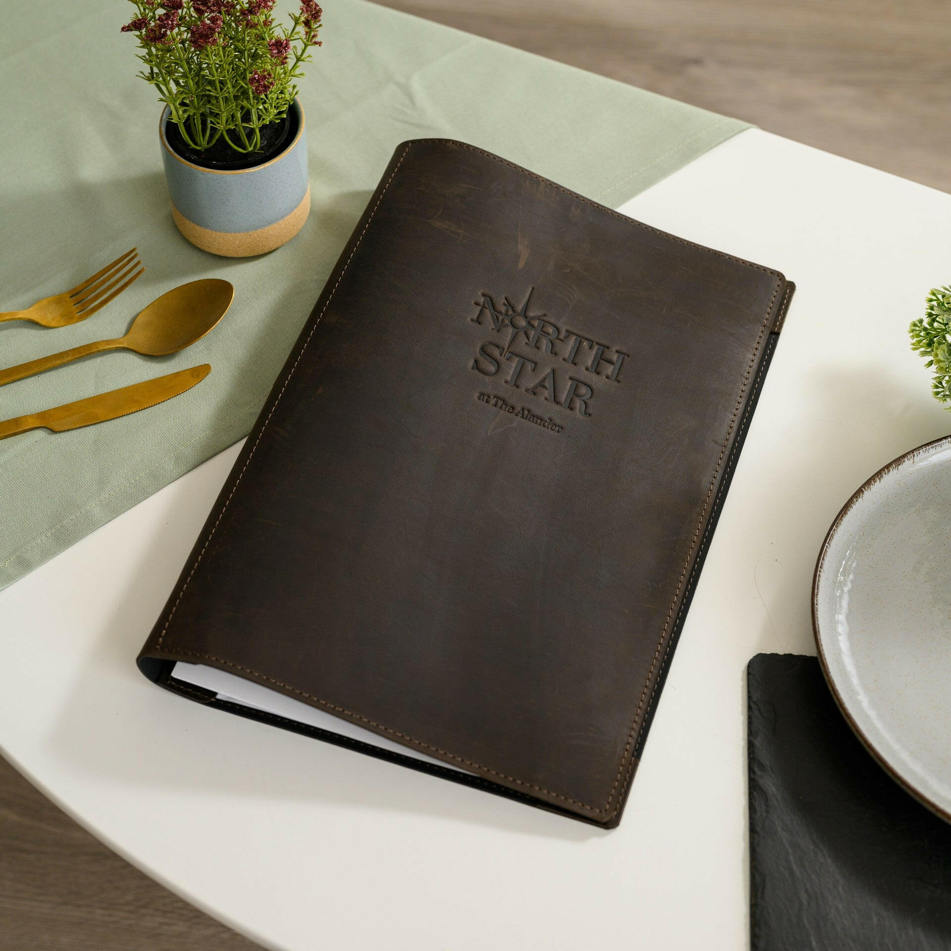  Impress with our menu case folder, featuring logo embossing for a personalized touch.