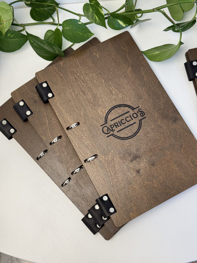 Plywood menu boards with ring binder for Capriccio’s