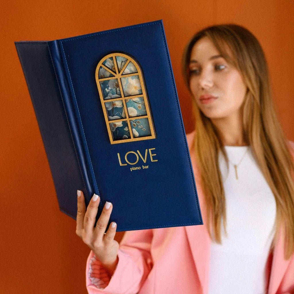 Custom restaurant menu cover with debossing, UV-DTF logo print, and plywood window for professional table service.