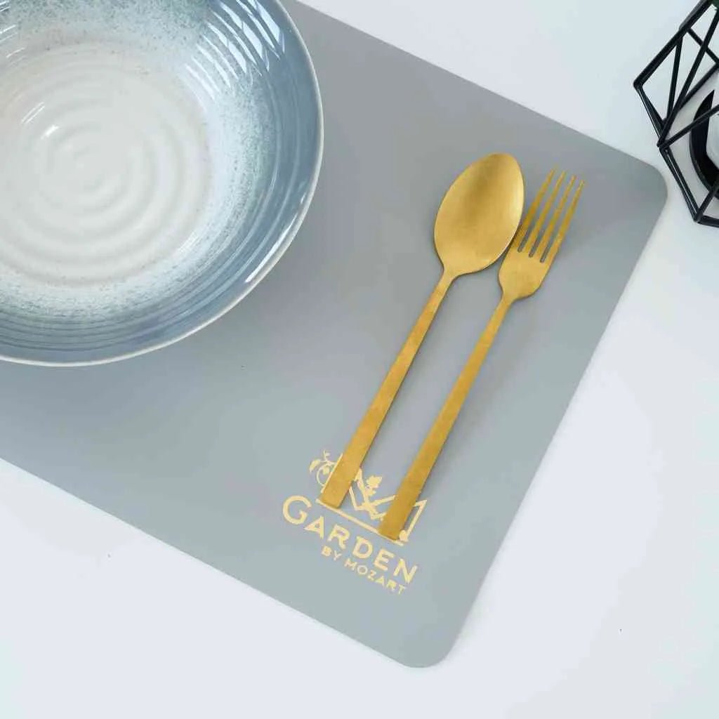 Rectangular faux leather placemat in gray-brown used in a minimalistic table setting