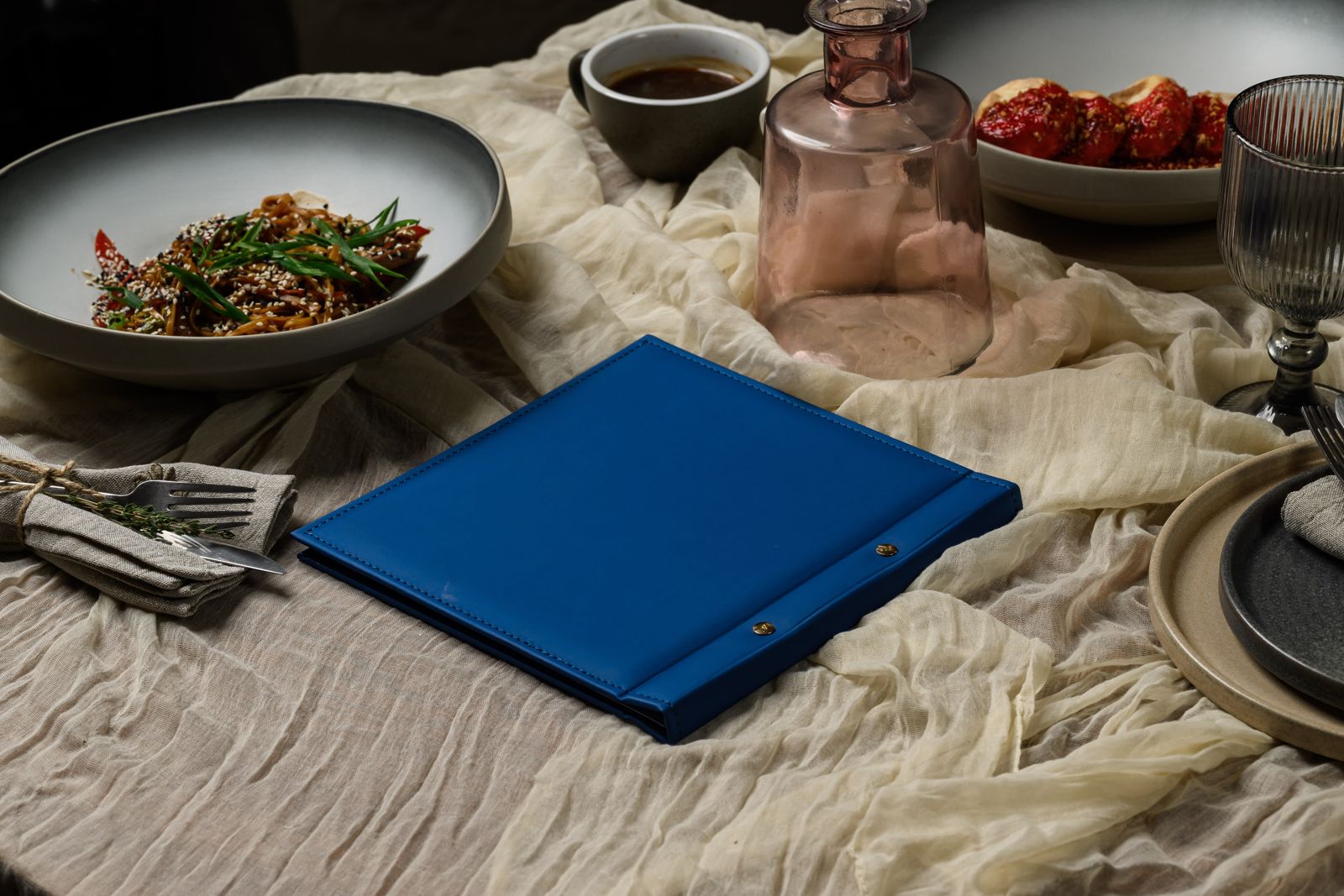 Blue menu folder with blind-embossed logo