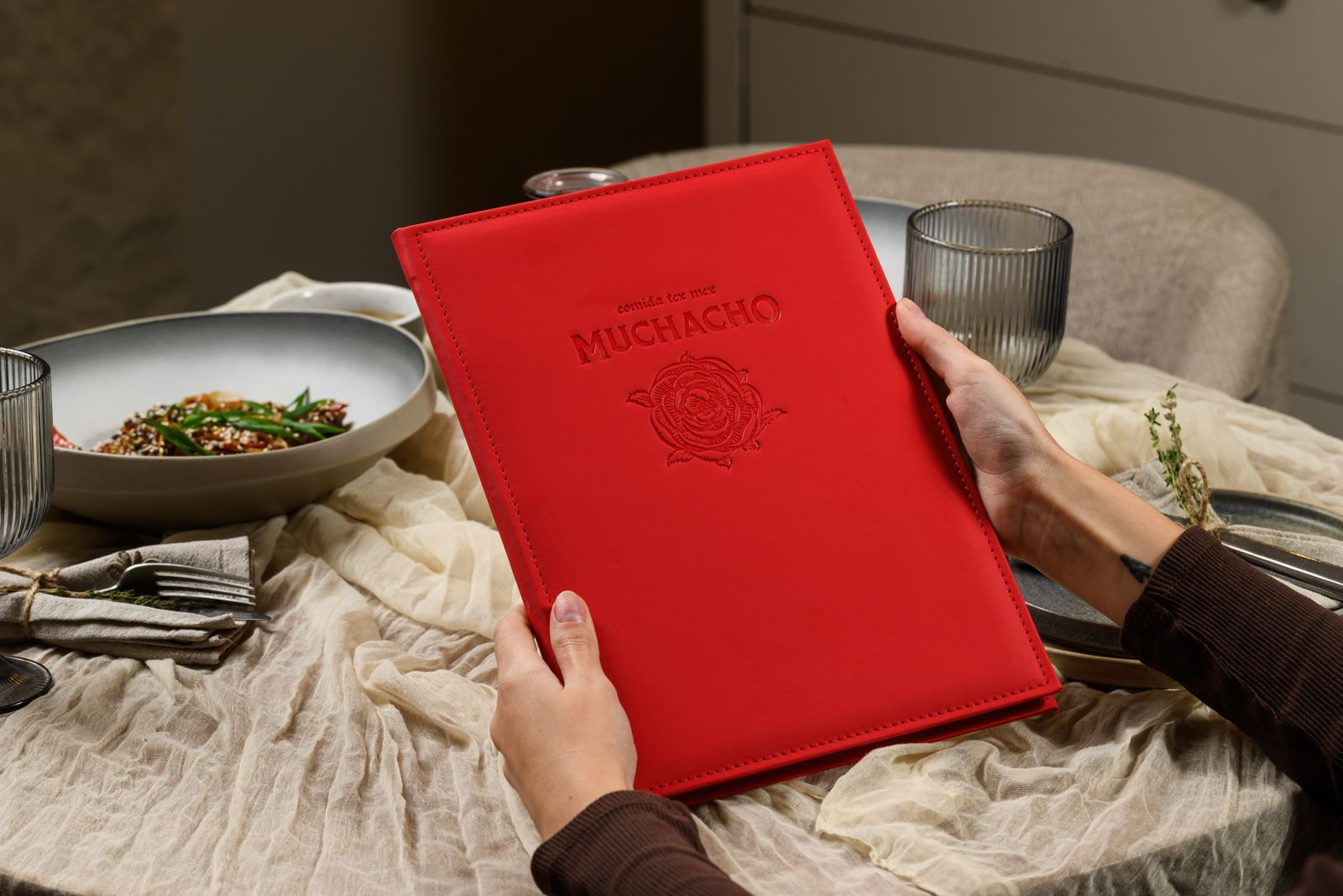 Red menu cover with embossed logo