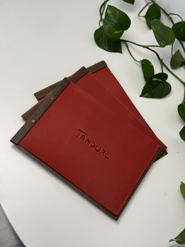 Leather-faced menu boards, blind embossing for Tandure