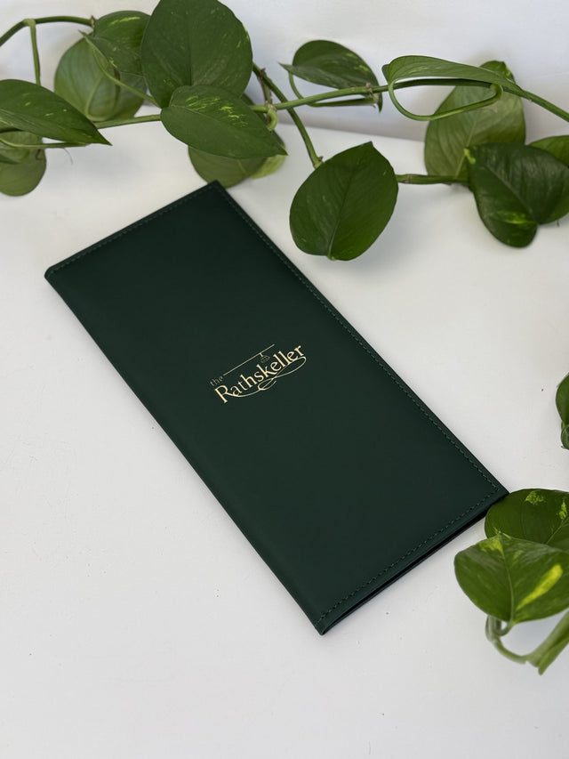 Faux leather menu covers, gold foil logo for Rathskeller