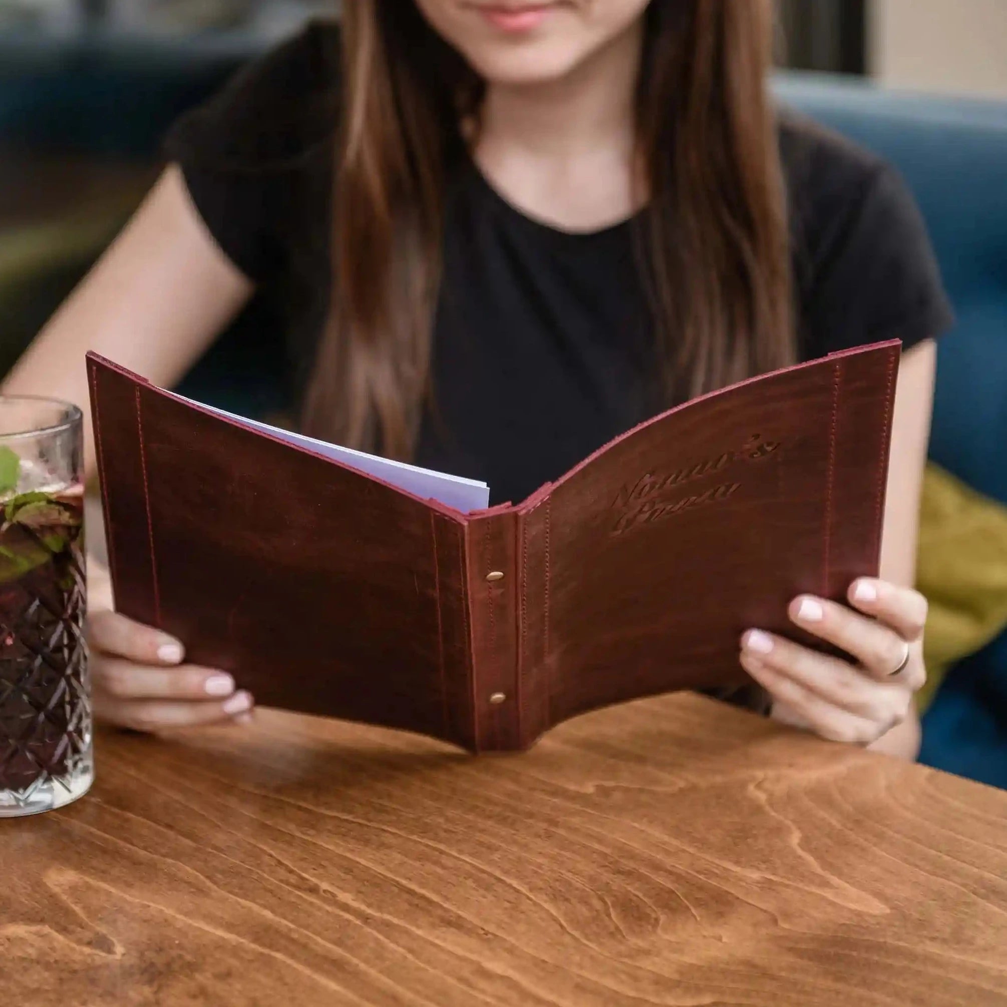 Add a unique flair to your dining experience with our custom leather binder, designed for restaurant menus.