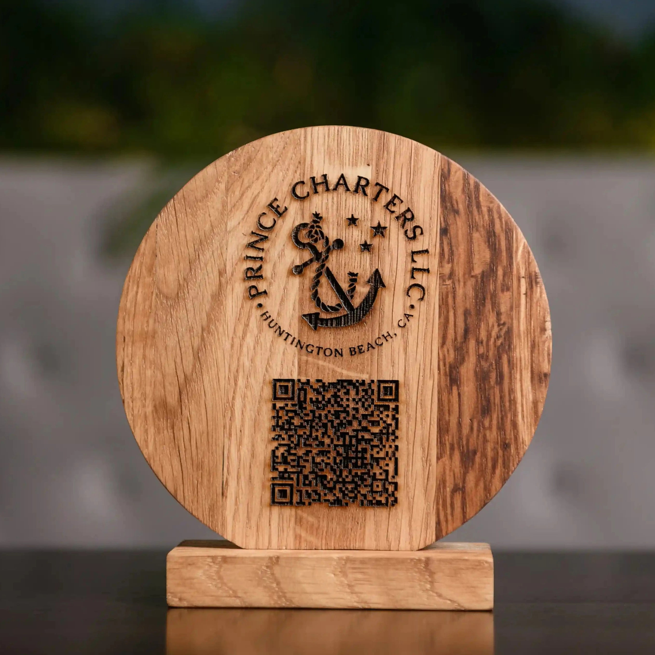 Beautifully crafted wooden menu display with engraved logo and QR code for a modern dining experience